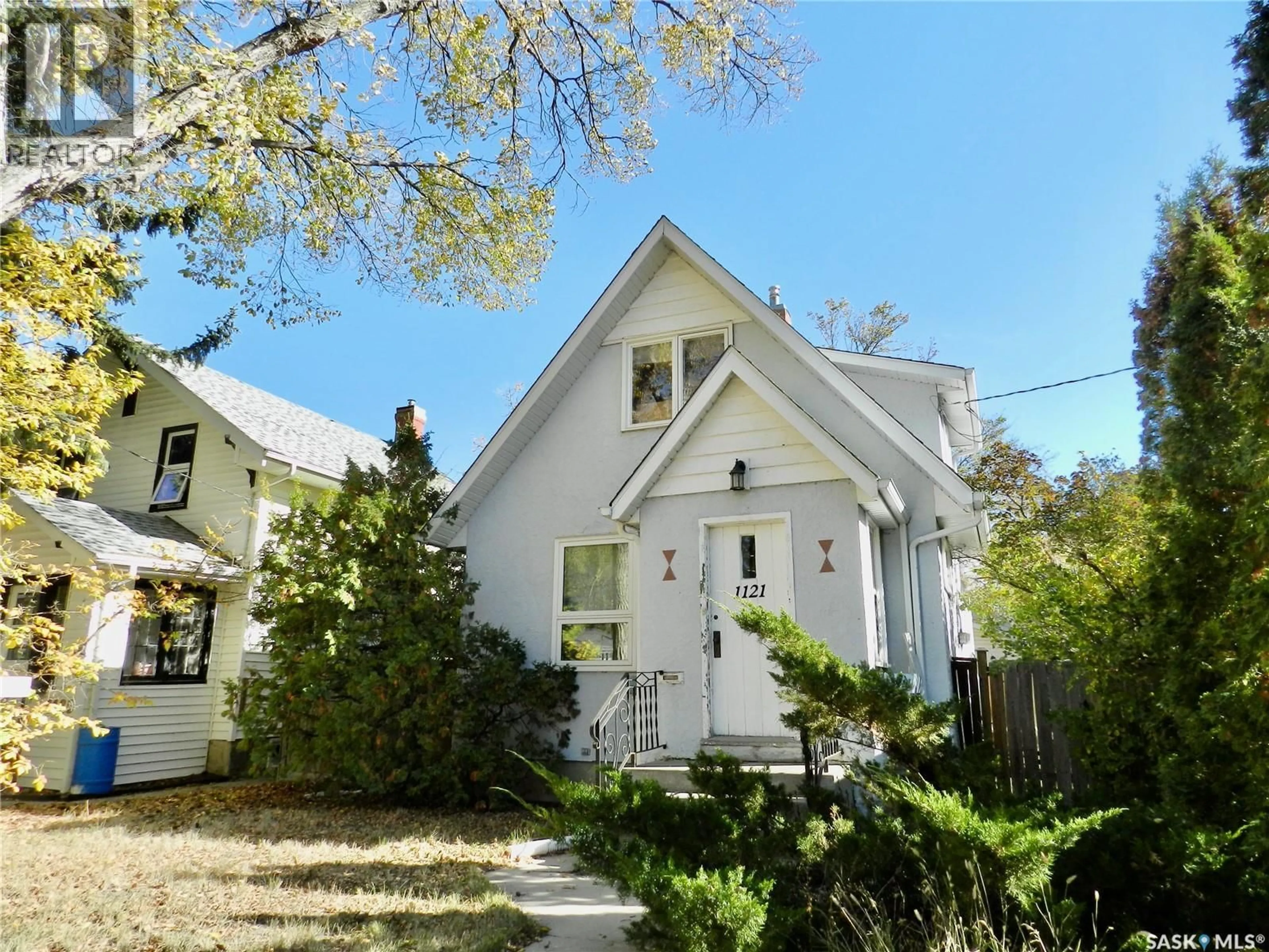A pic from outside/outdoor area/front of a property/back of a property/a pic from drone, street for NW - 1121 6TH AVENUE, Moose Jaw Saskatchewan S6H4A7