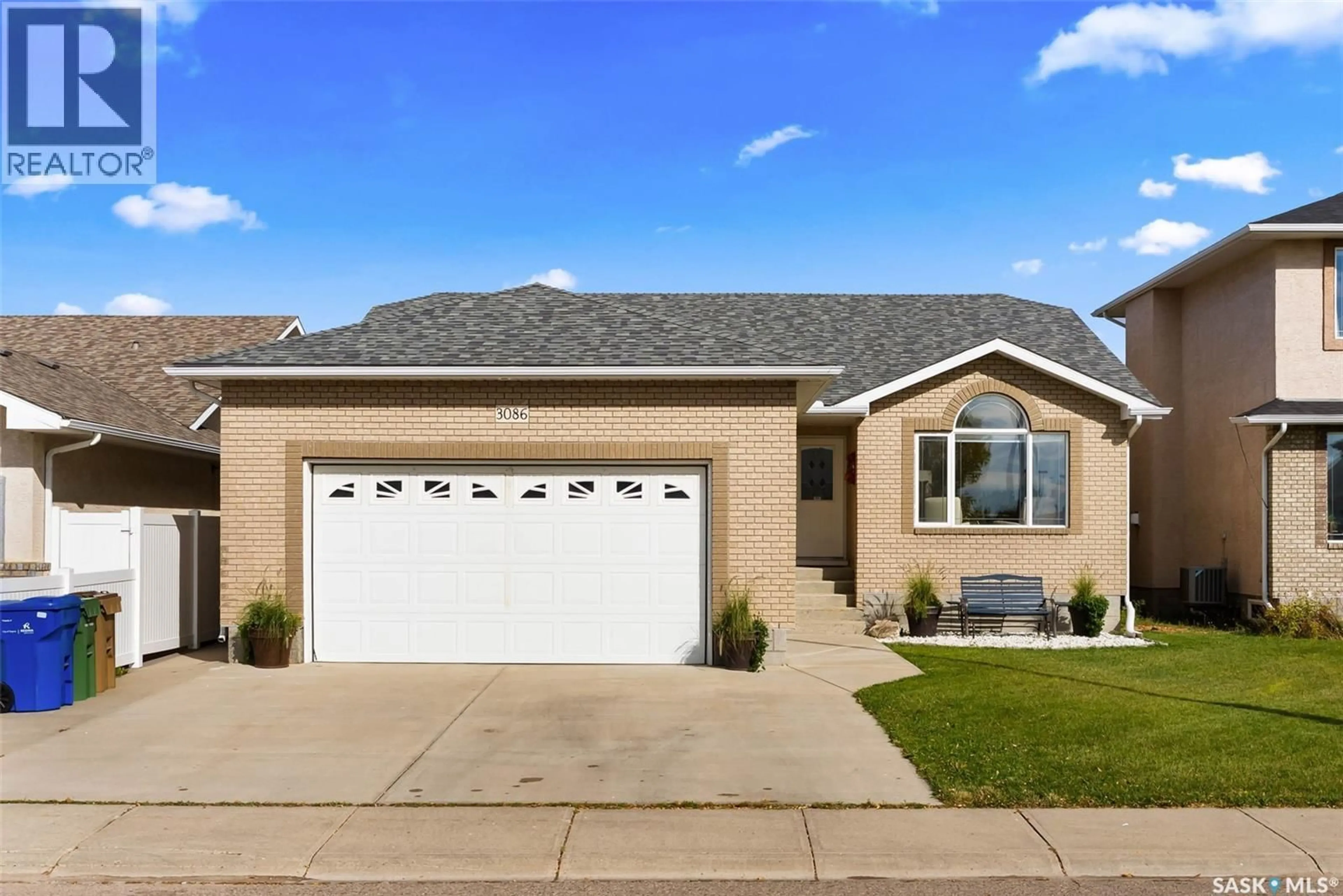 Home with vinyl exterior material, street for 3086 CRANBOURN CRESCENT, Regina Saskatchewan S4V3B3