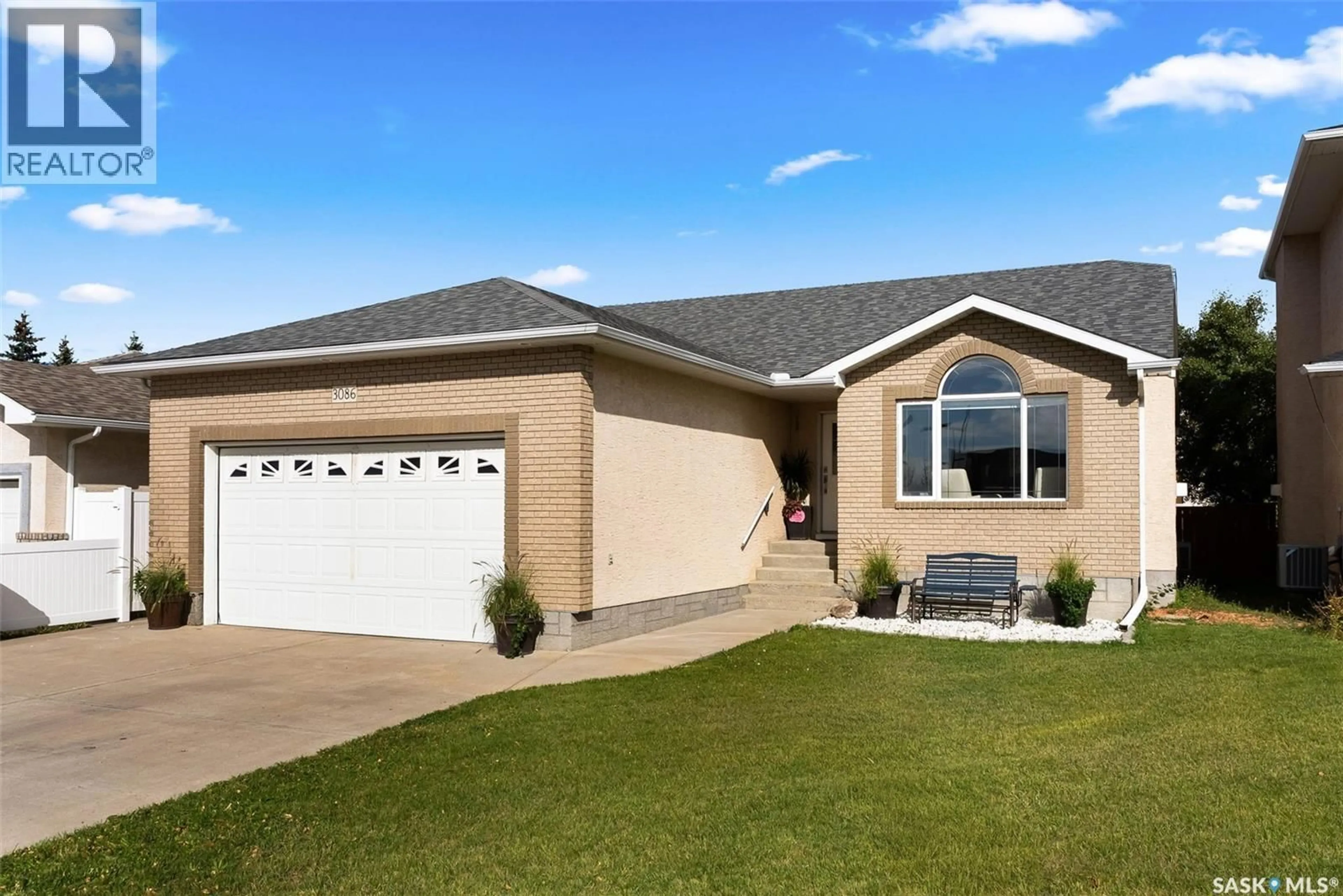 Home with vinyl exterior material, street for 3086 CRANBOURN CRESCENT, Regina Saskatchewan S4V3B3
