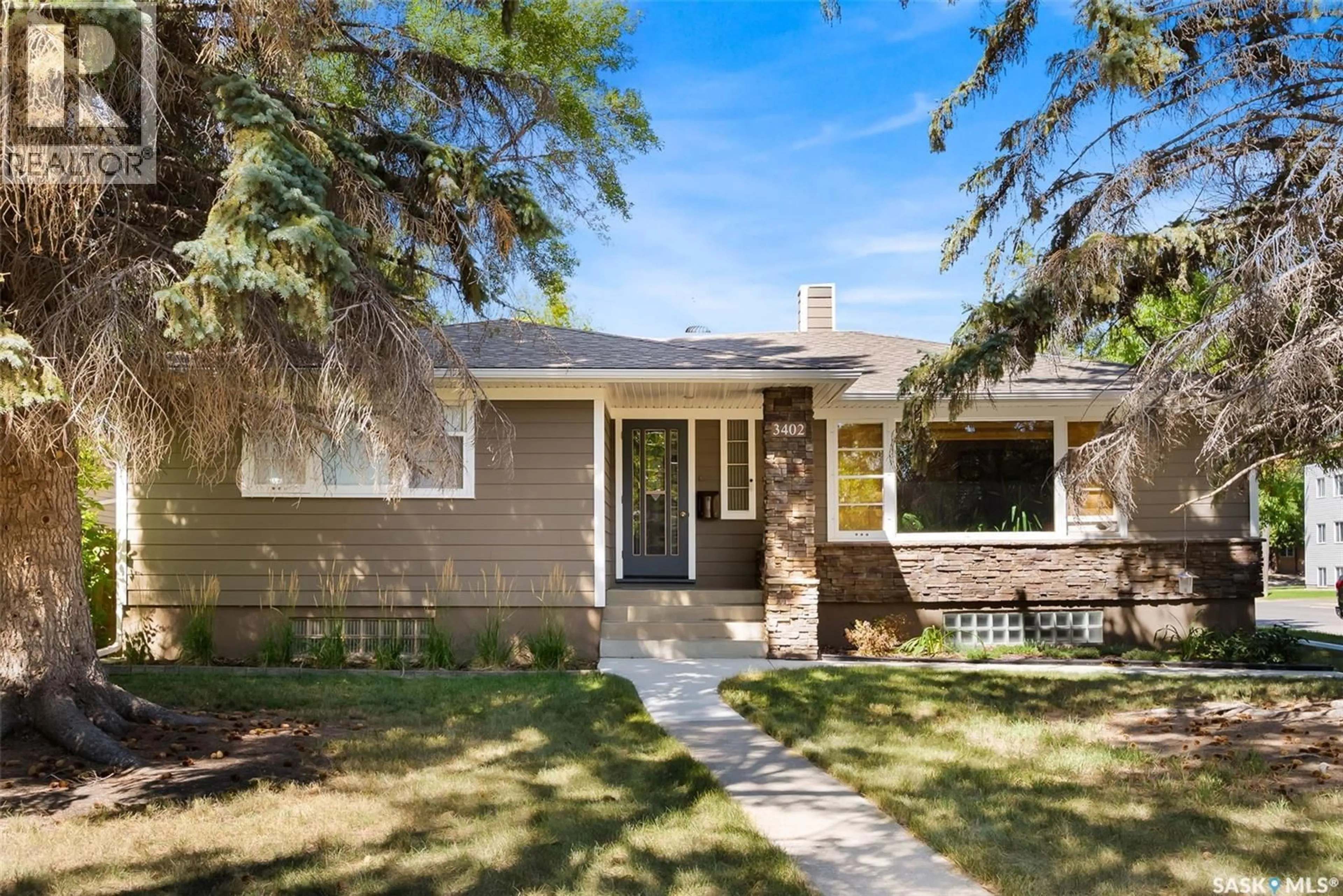 Home with vinyl exterior material, street for 3402 WESTGATE AVENUE, Regina Saskatchewan S4S1B5