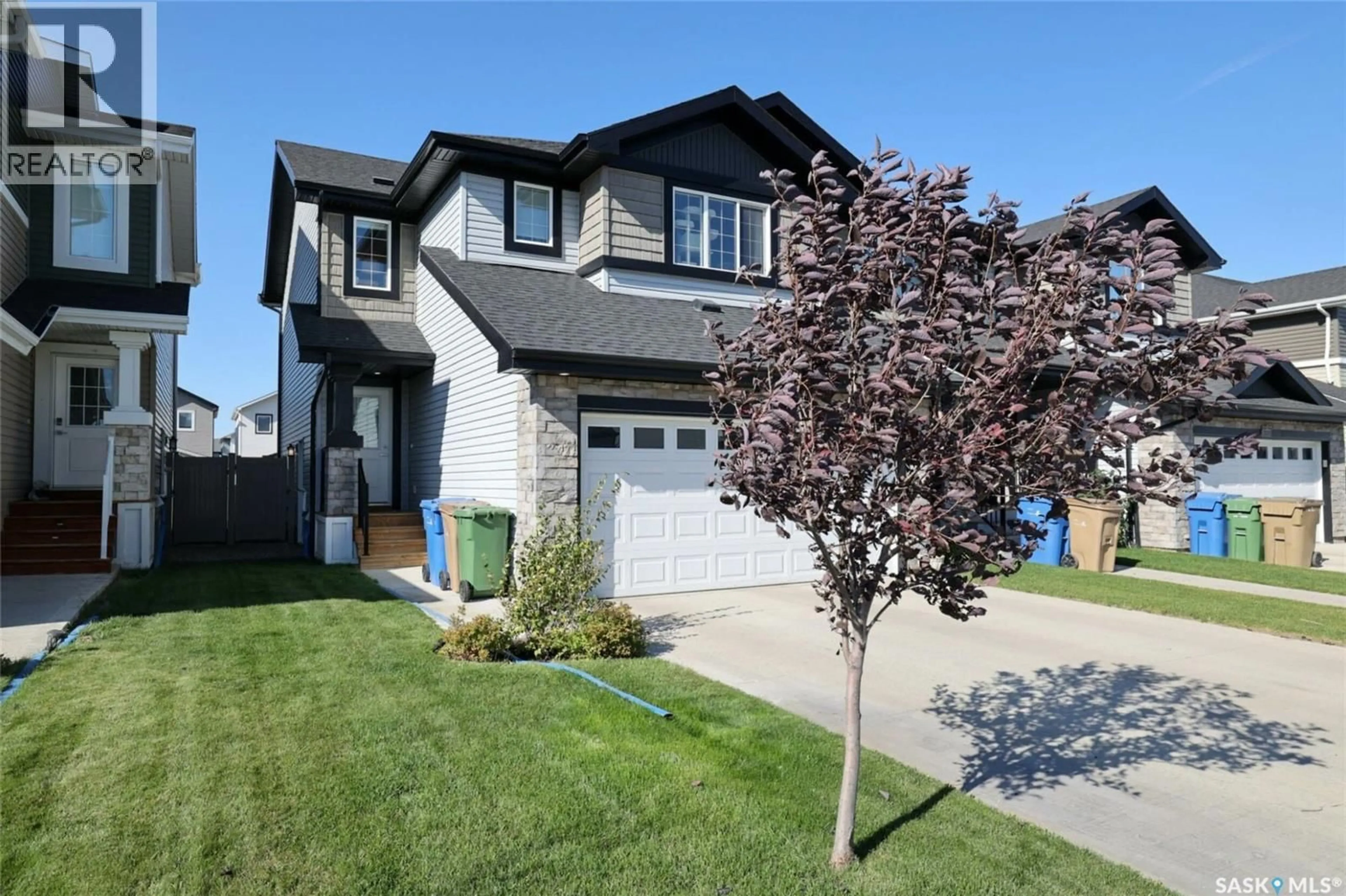 Home with vinyl exterior material, street for 1780 MUSTARD STREET, Regina Saskatchewan S4Y0G1