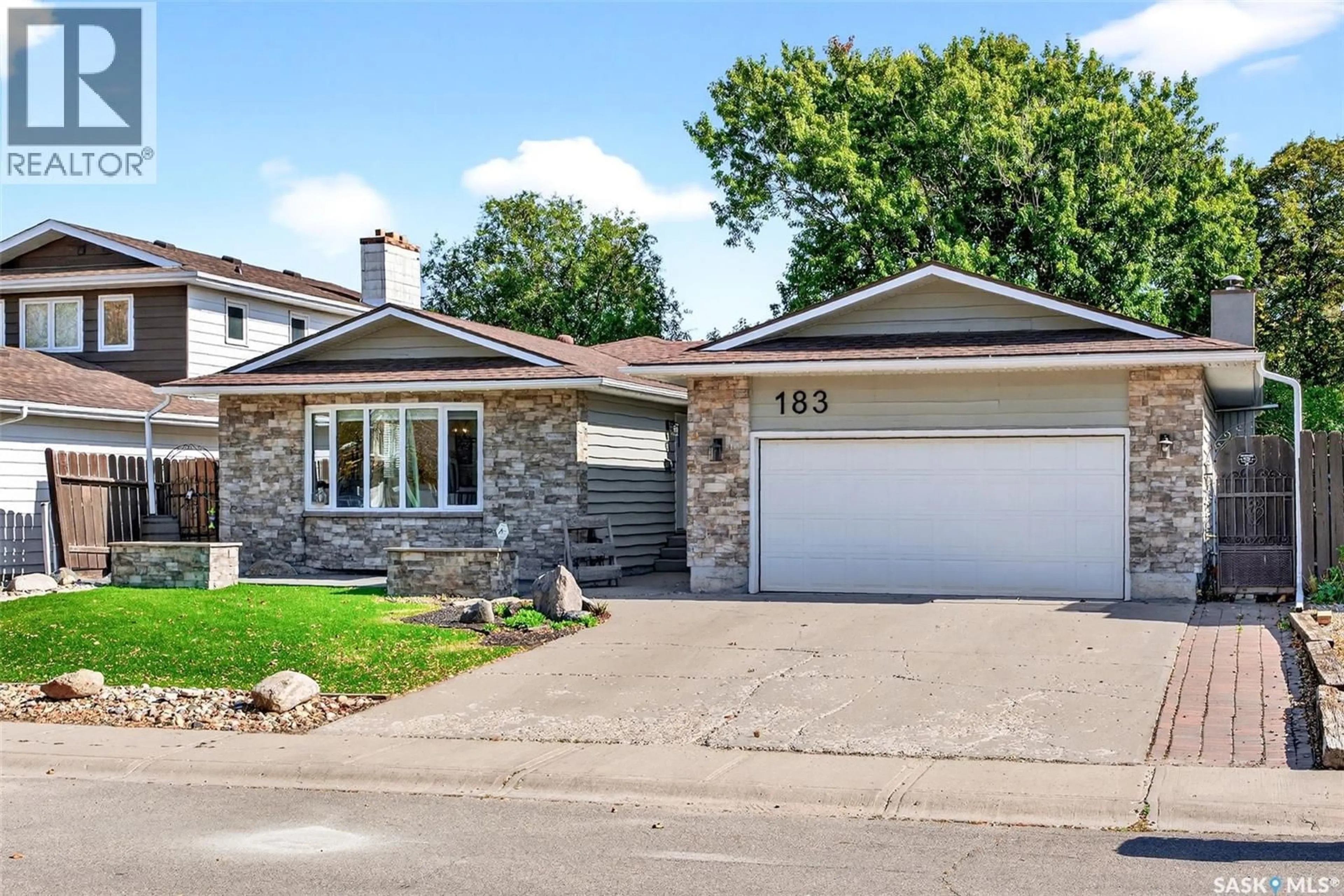 Home with vinyl exterior material, street for 183 ROGERS ROAD, Regina Saskatchewan S4S6V1