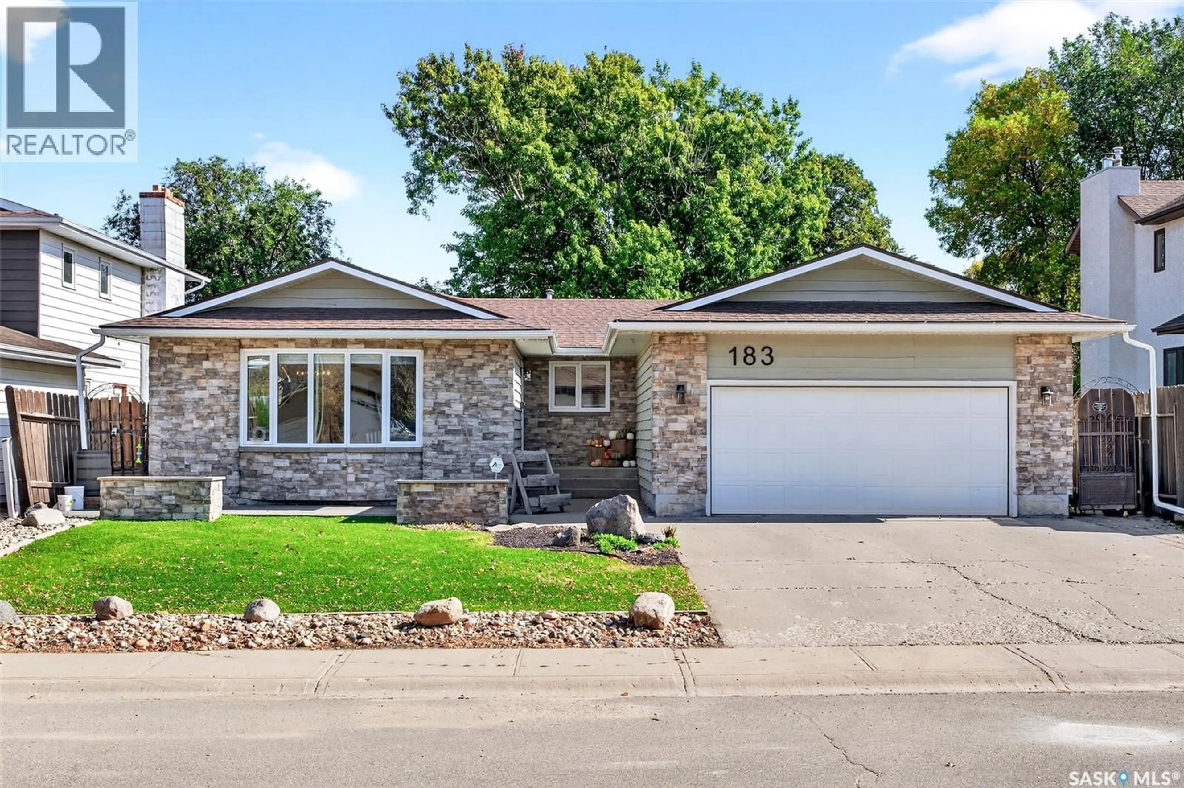 Home with brick exterior material, street for 183 ROGERS ROAD, Regina Saskatchewan S4S6V1