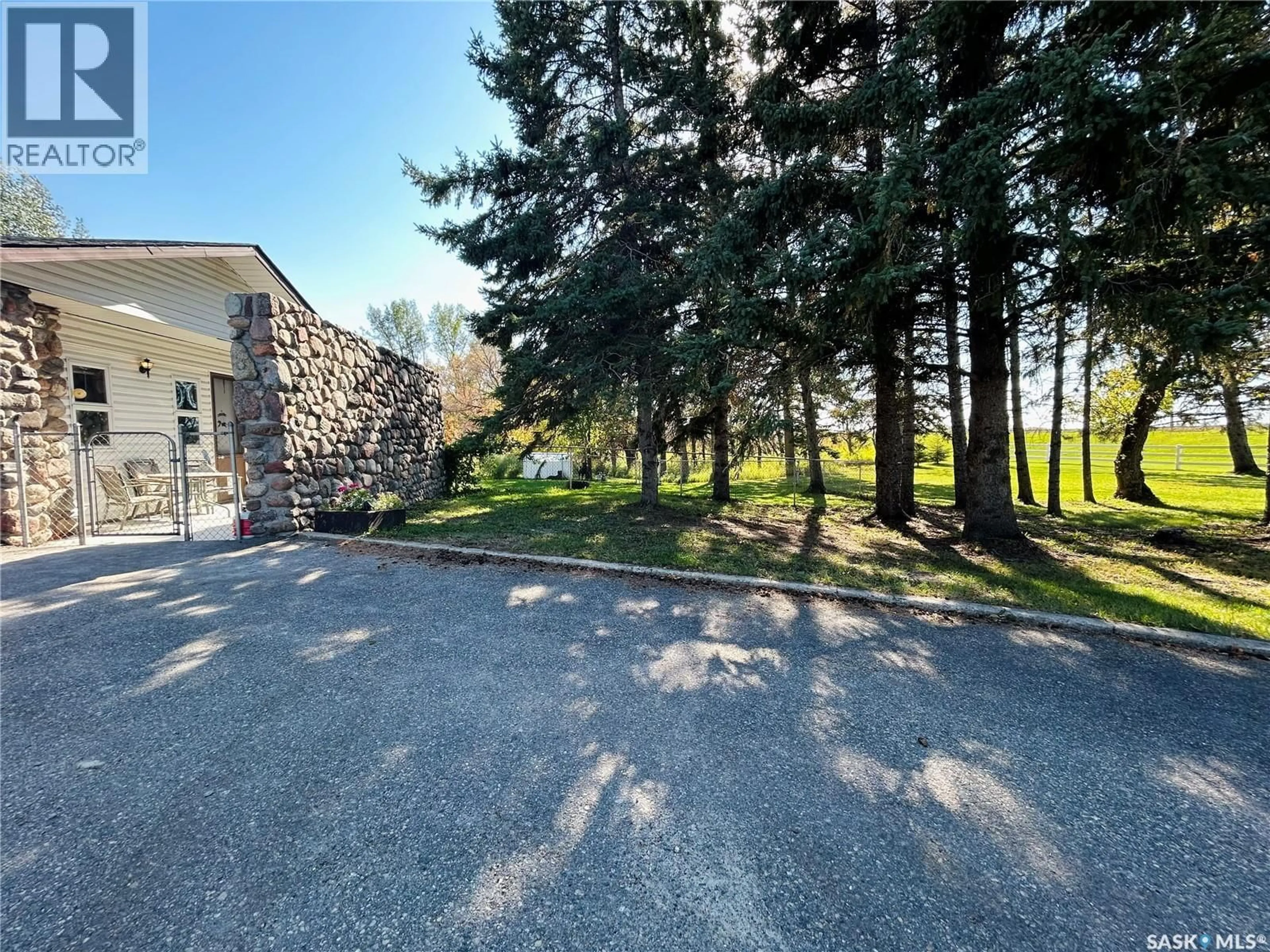 A pic from outside/outdoor area/front of a property/back of a property/a pic from drone, mountain view for FIELDSTONE GROVE ACREAGE, Moosomin Rm No. 121 Saskatchewan S0G3N0