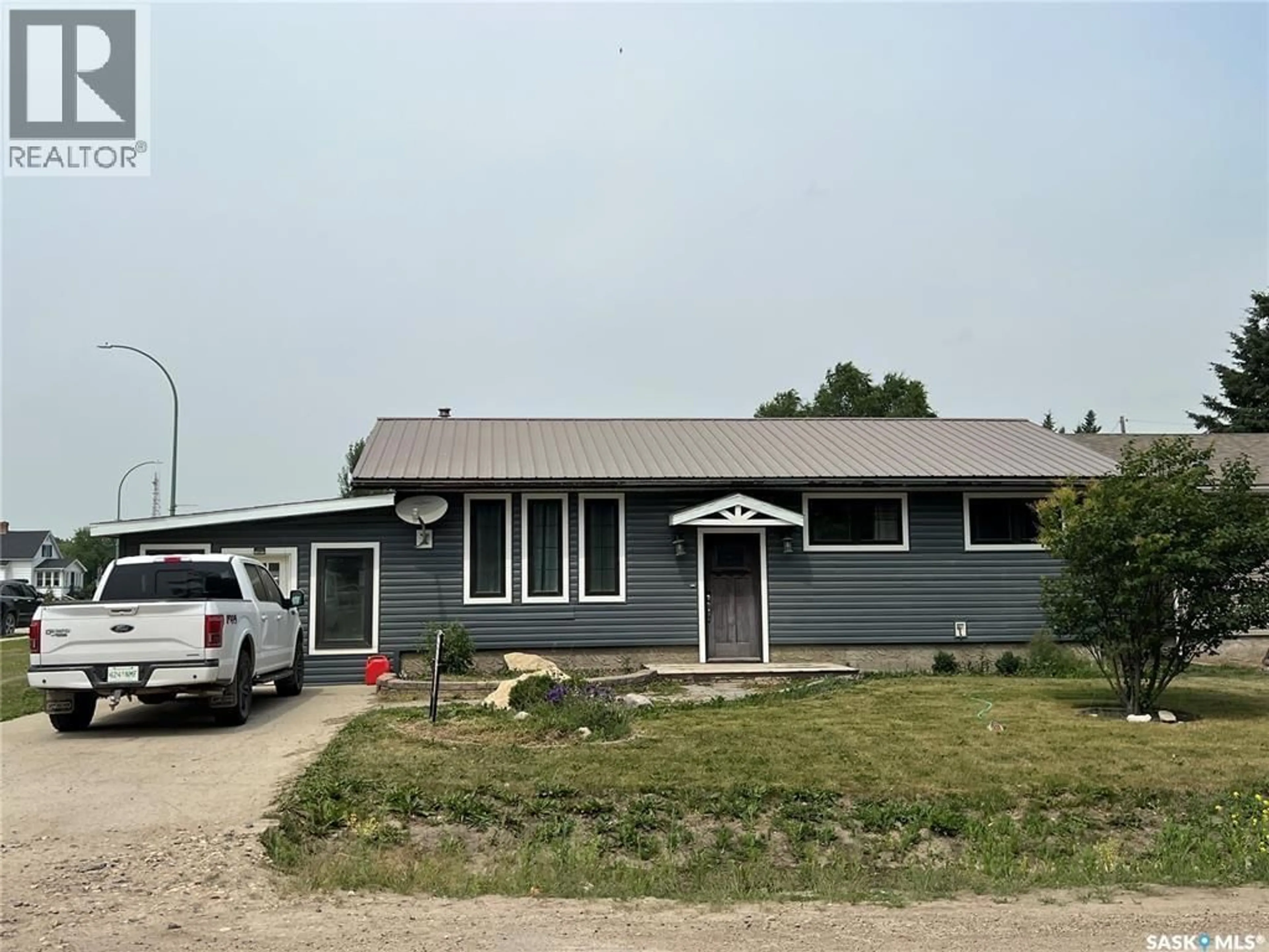 Home with vinyl exterior material, street for 104 COOPER STREET, Porcupine Plain Saskatchewan S0E1H0