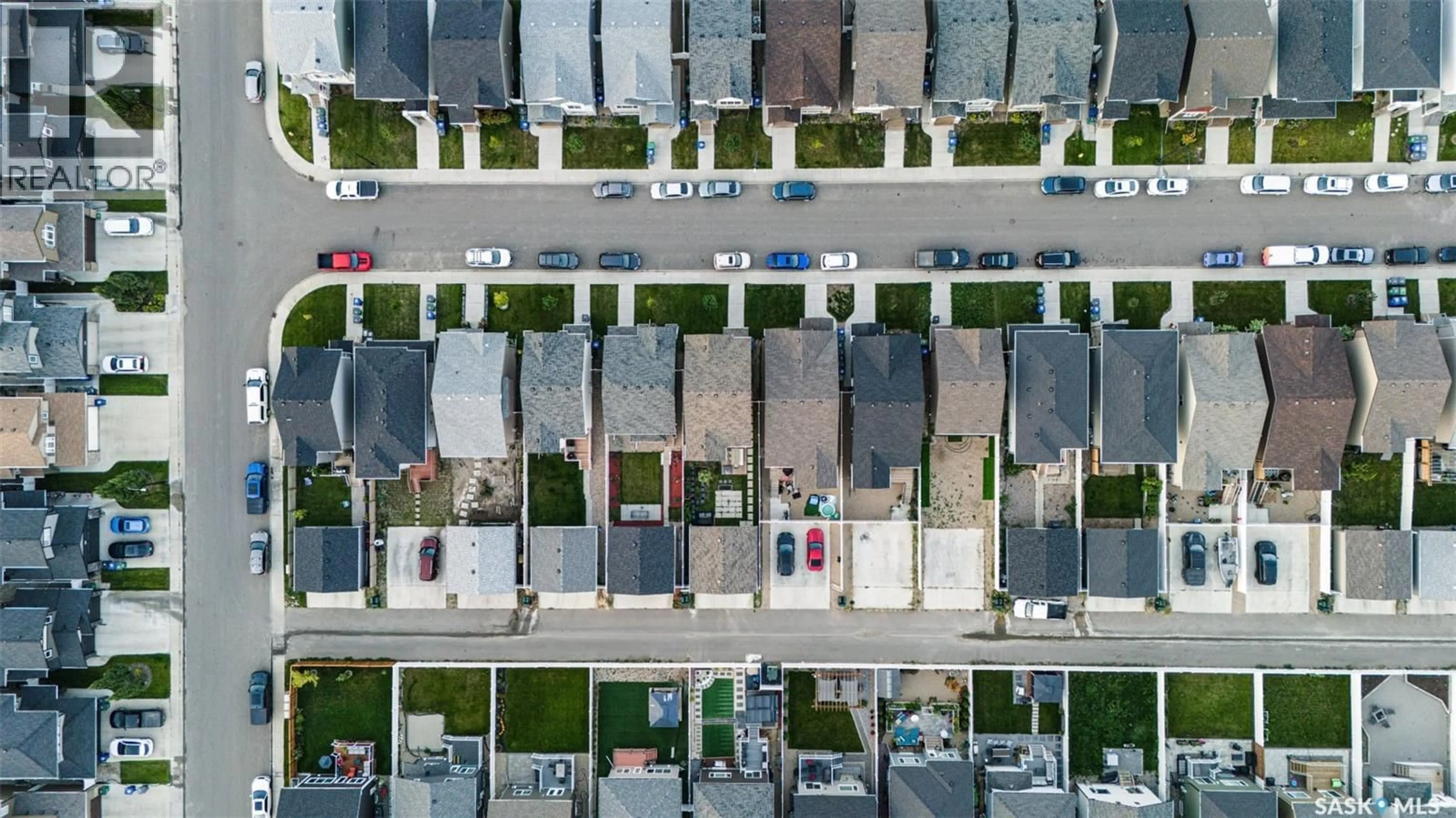 A pic from outside/outdoor area/front of a property/back of a property/a pic from drone, street for 966 MCFAULL MANOR, Saskatoon Saskatchewan S7V0S6