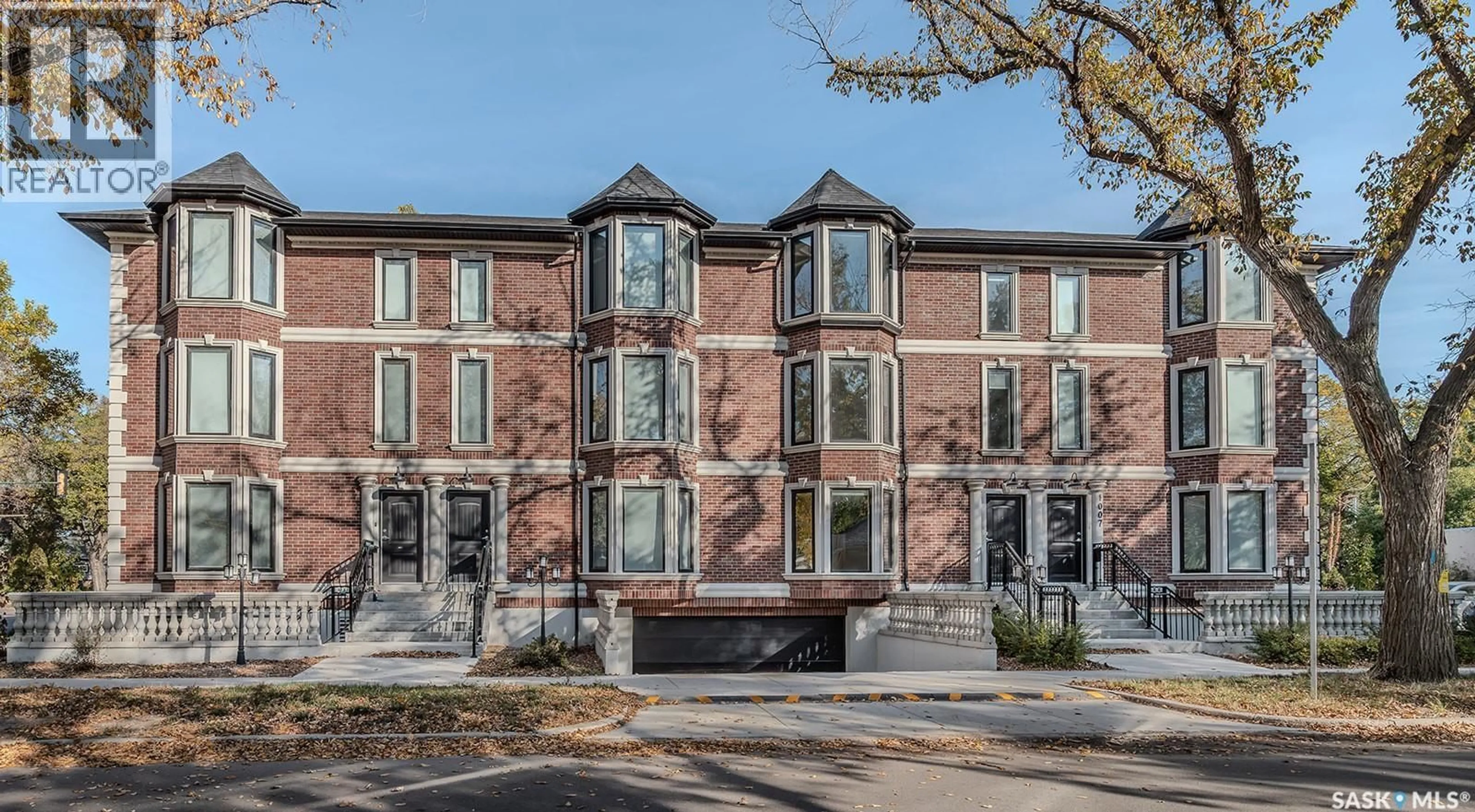 Home with brick exterior material, street for 1001 OSLER STREET, Saskatoon Saskatchewan S7N0T5