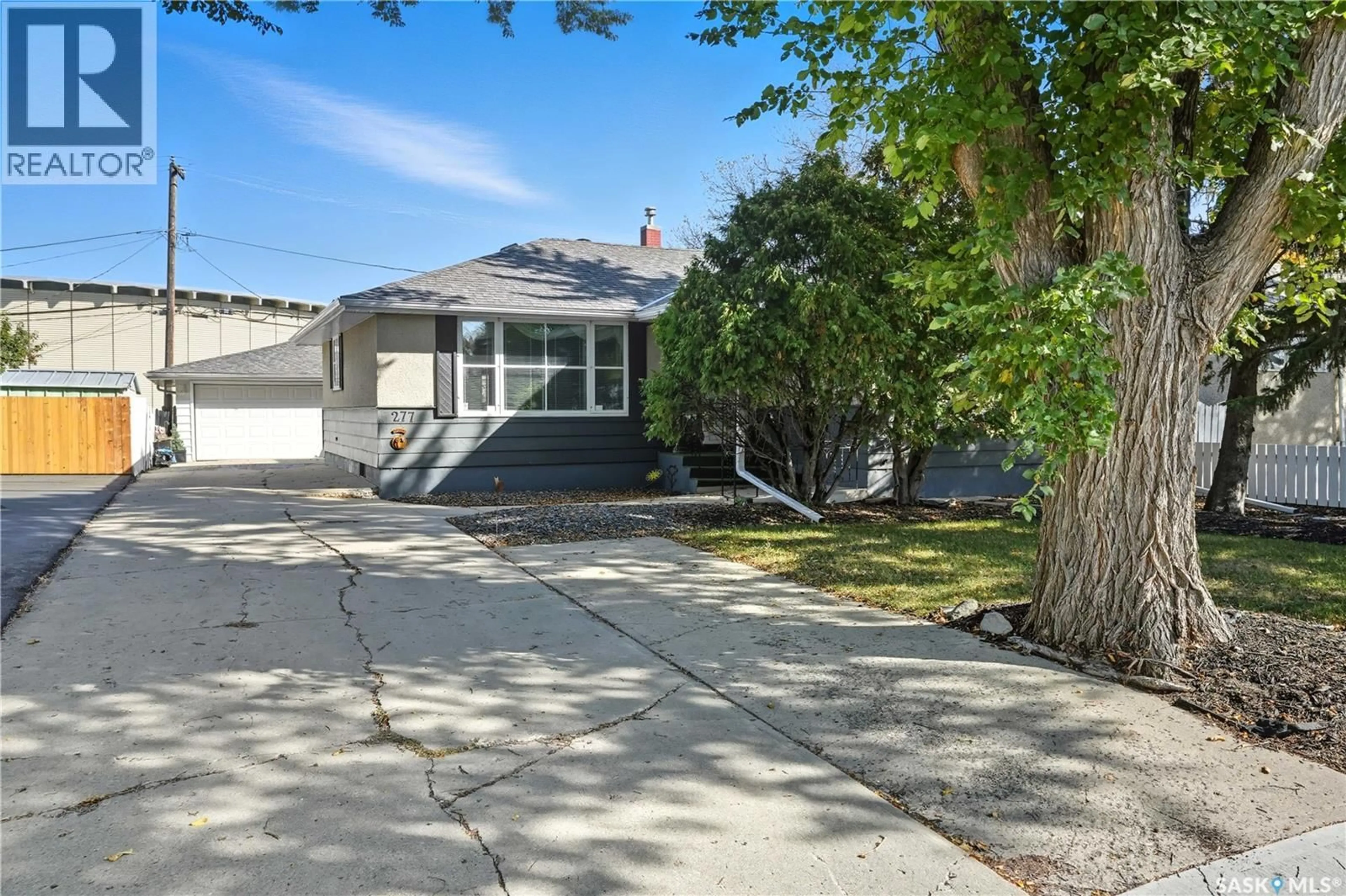 A pic from outside/outdoor area/front of a property/back of a property/a pic from drone, street for 277 COLDWELL ROAD, Regina Saskatchewan S4R4L4