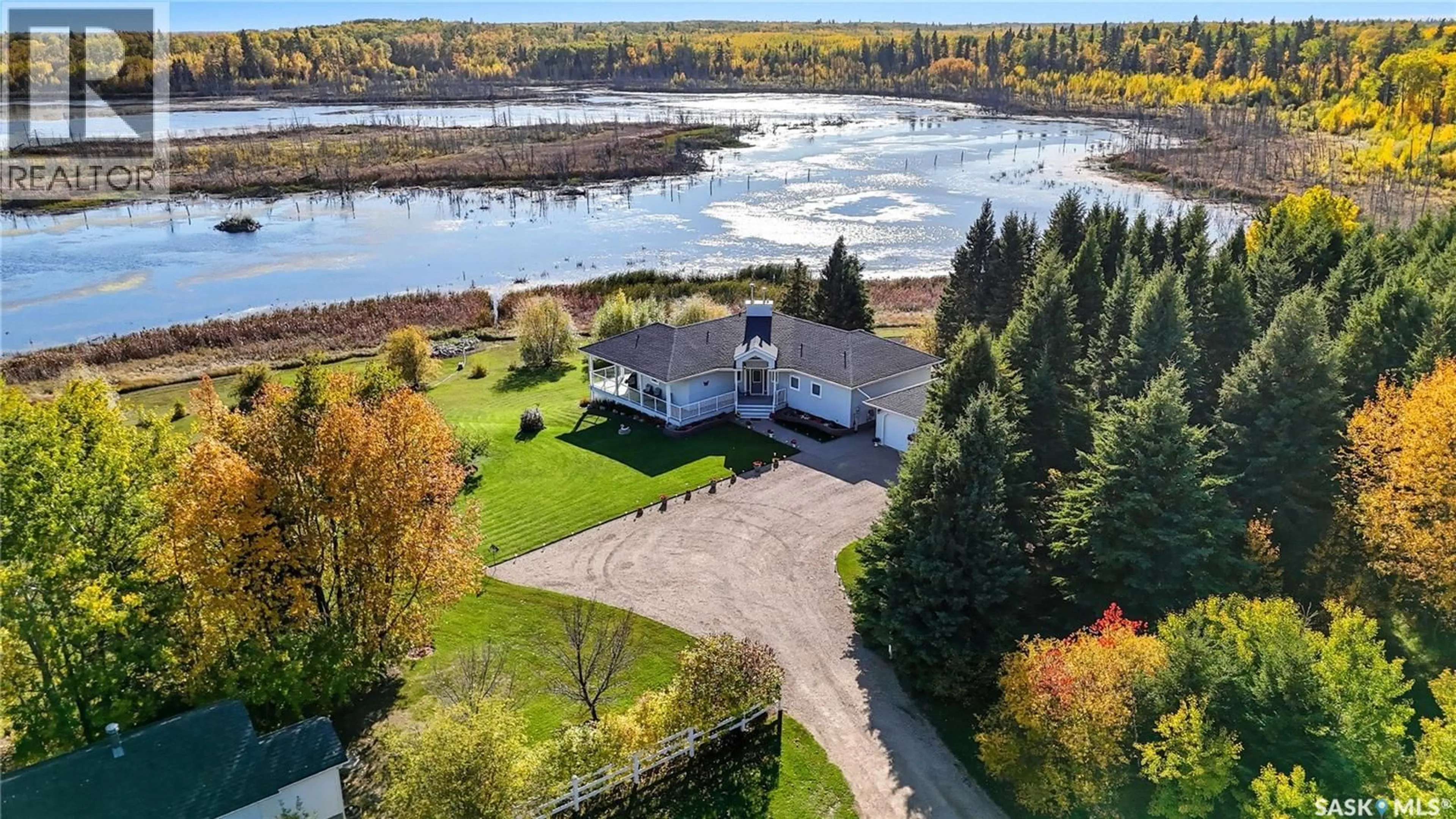 A pic from outside/outdoor area/front of a property/back of a property/a pic from drone, water/lake/river/ocean view for 119 ASPEN CRESCENT, Christopher Lake Saskatchewan S0J0N0