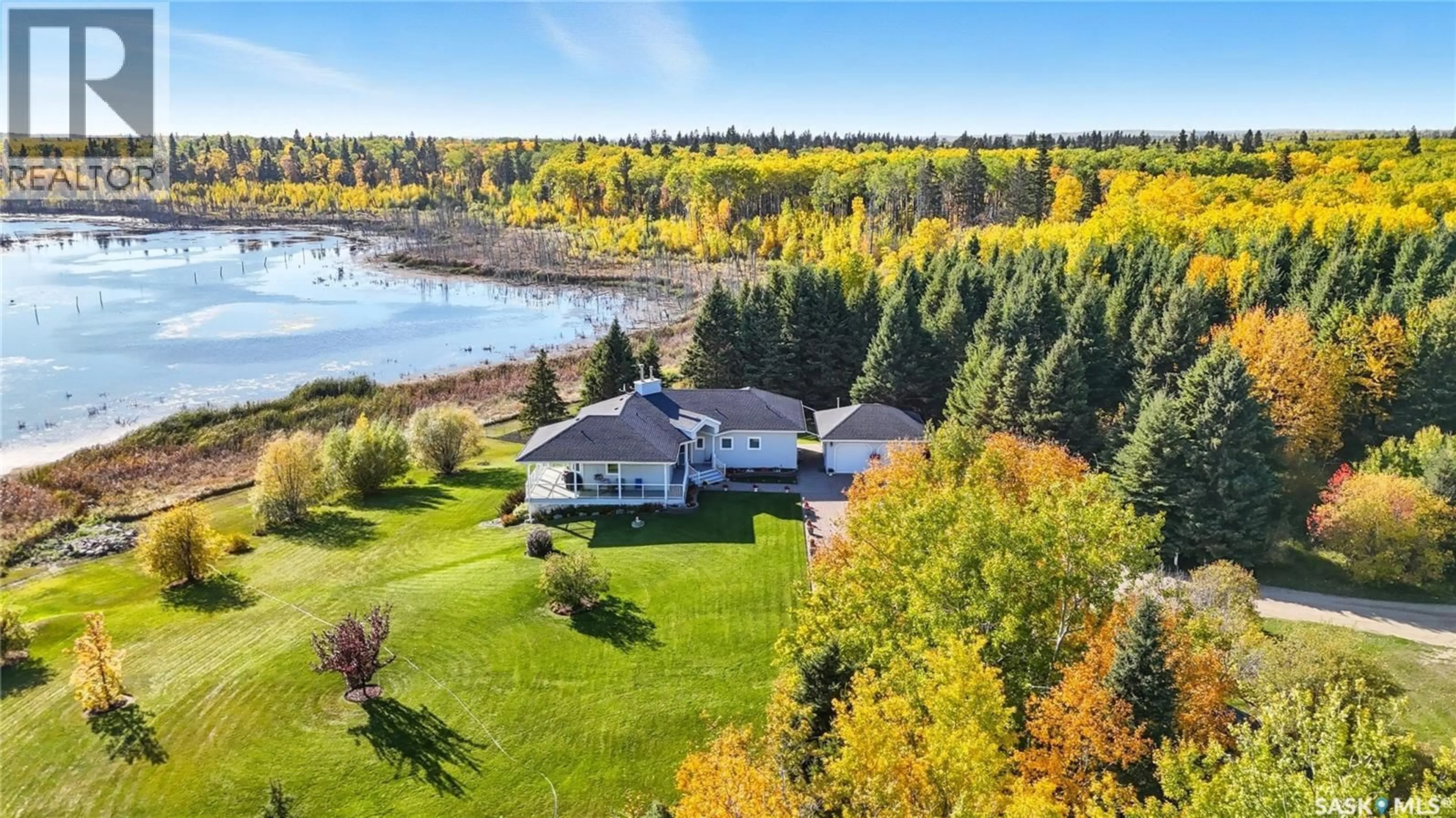 A pic from outside/outdoor area/front of a property/back of a property/a pic from drone, water/lake/river/ocean view for 119 ASPEN CRESCENT, Christopher Lake Saskatchewan S0J0N0