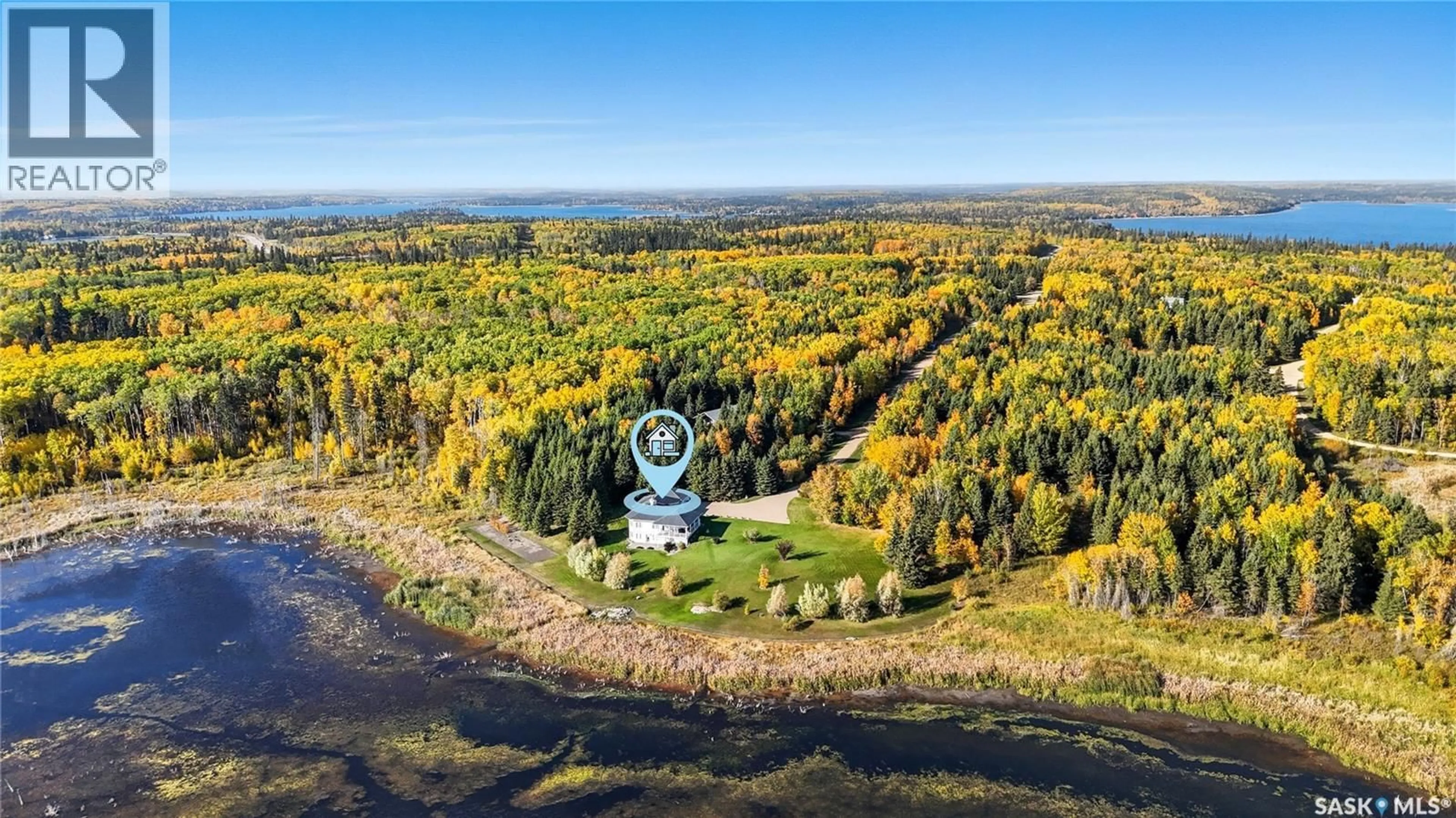 A pic from outside/outdoor area/front of a property/back of a property/a pic from drone, water/lake/river/ocean view for 119 ASPEN CRESCENT, Christopher Lake Saskatchewan S0J0N0