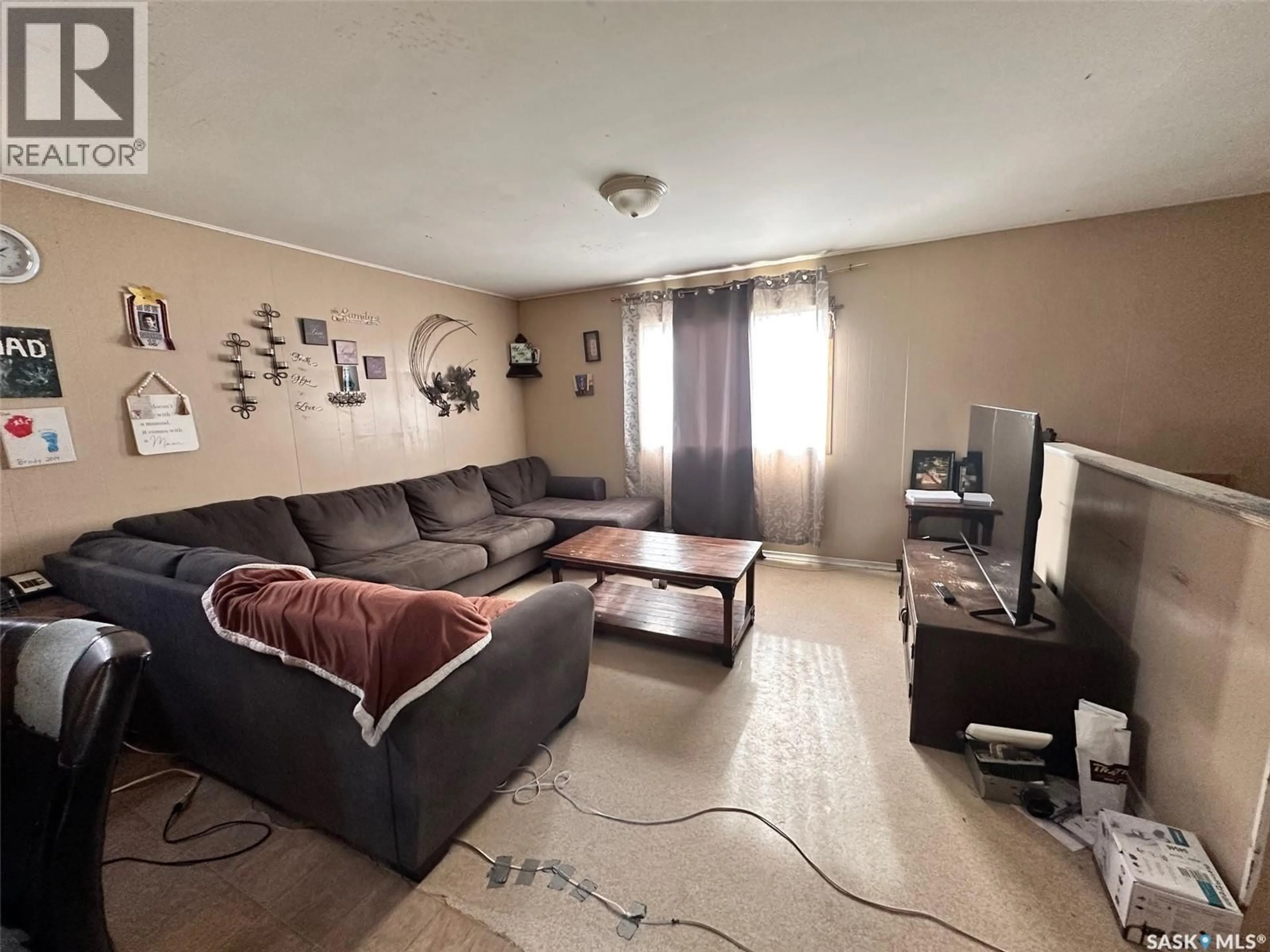 Living room with furniture, unknown for 202 MUSKWA STREET, Beauval Saskatchewan S0M0G0