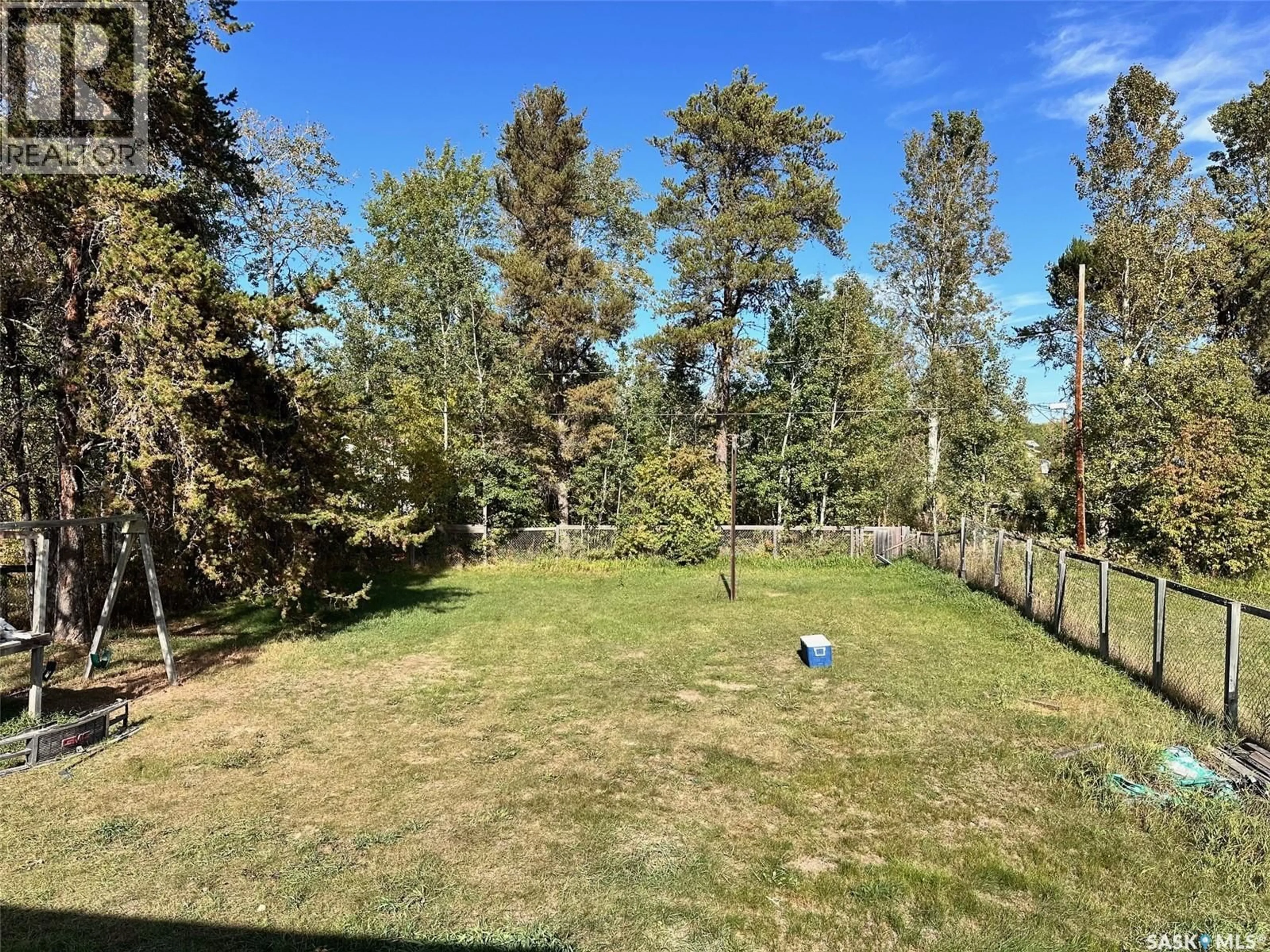 A pic from outside/outdoor area/front of a property/back of a property/a pic from drone, forest/trees view for 202 MUSKWA STREET, Beauval Saskatchewan S0M0G0