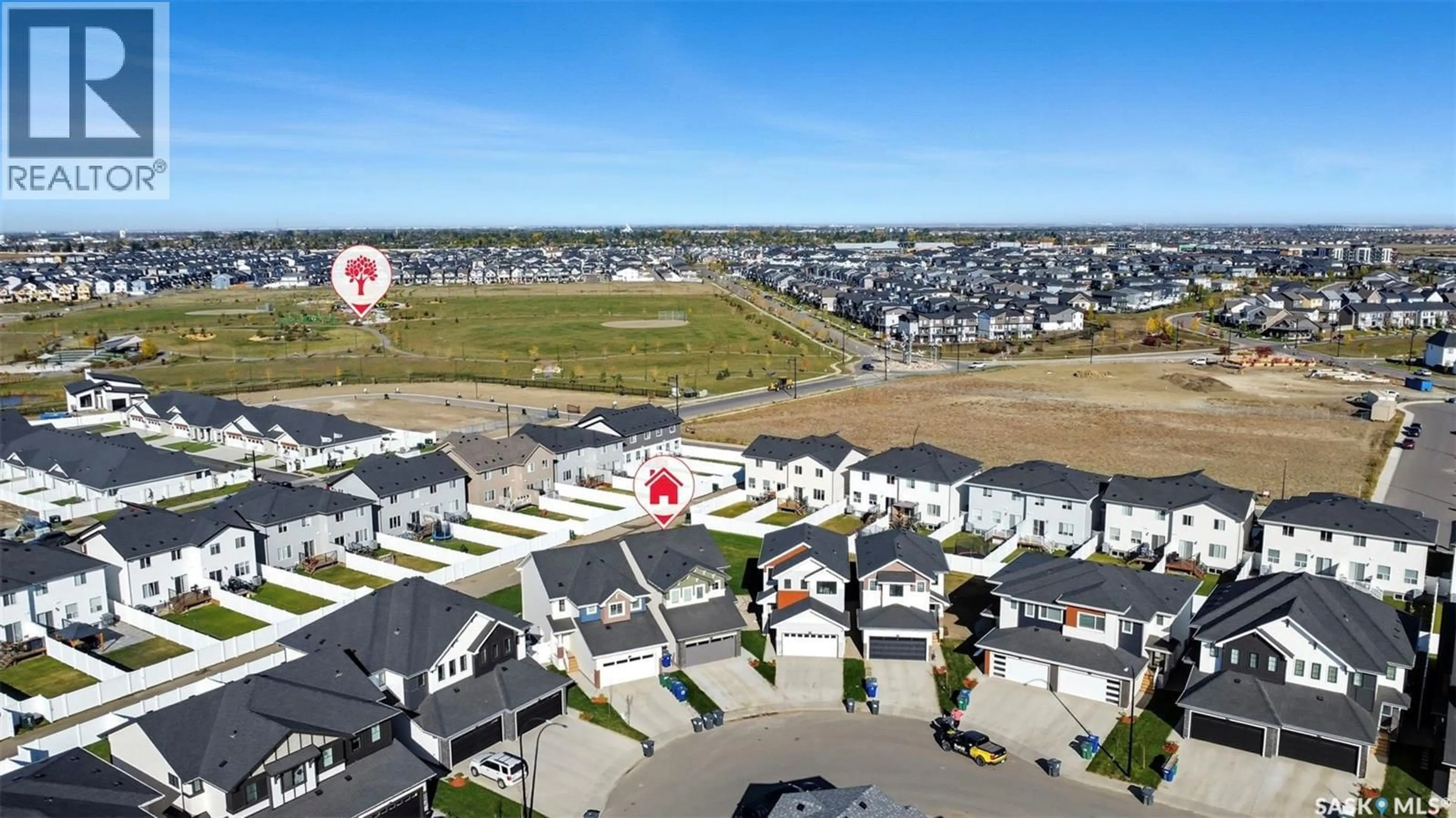 A pic from outside/outdoor area/front of a property/back of a property/a pic from drone, street for 266 SCHMEISER BEND, Saskatoon Saskatchewan S7V1P7