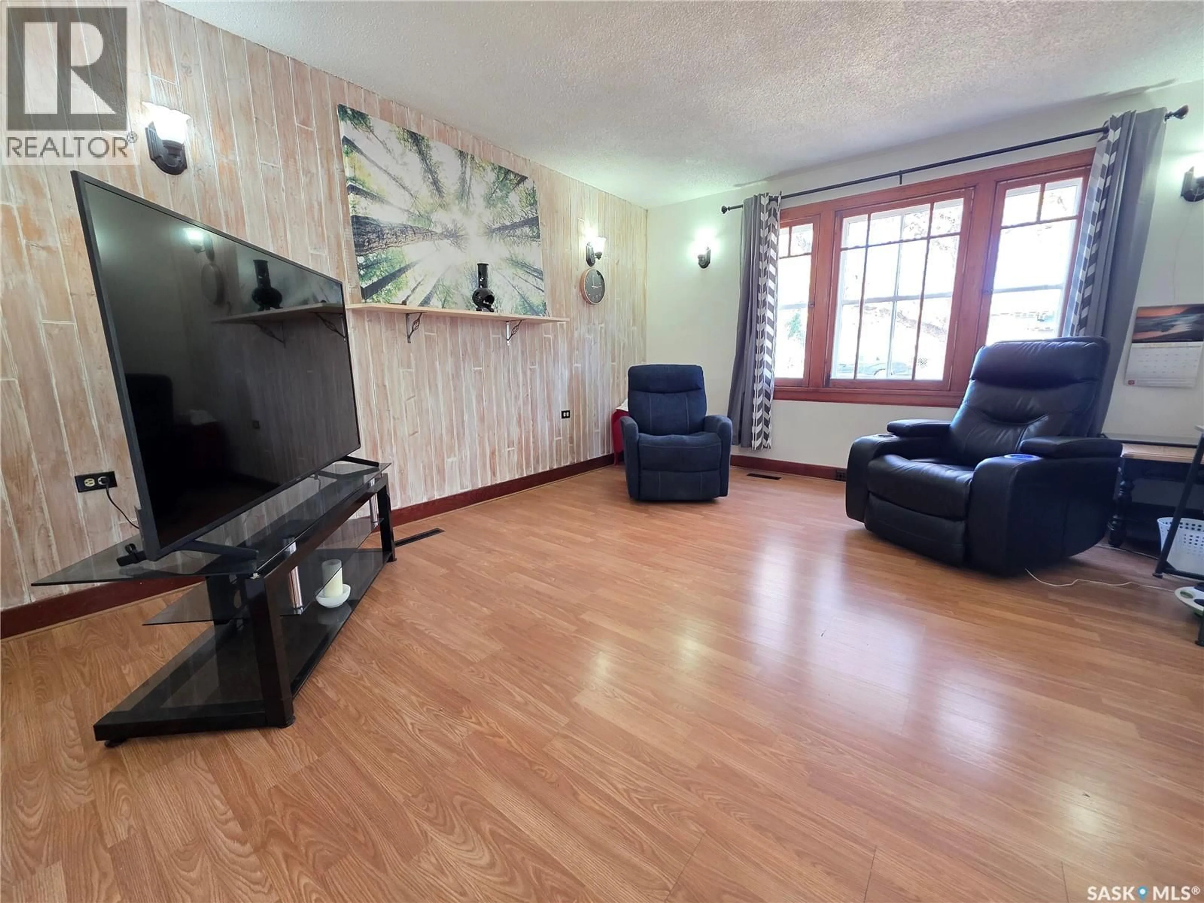 Living room with furniture, unknown for 210 2ND STREET, Cabri Saskatchewan S0N0J0
