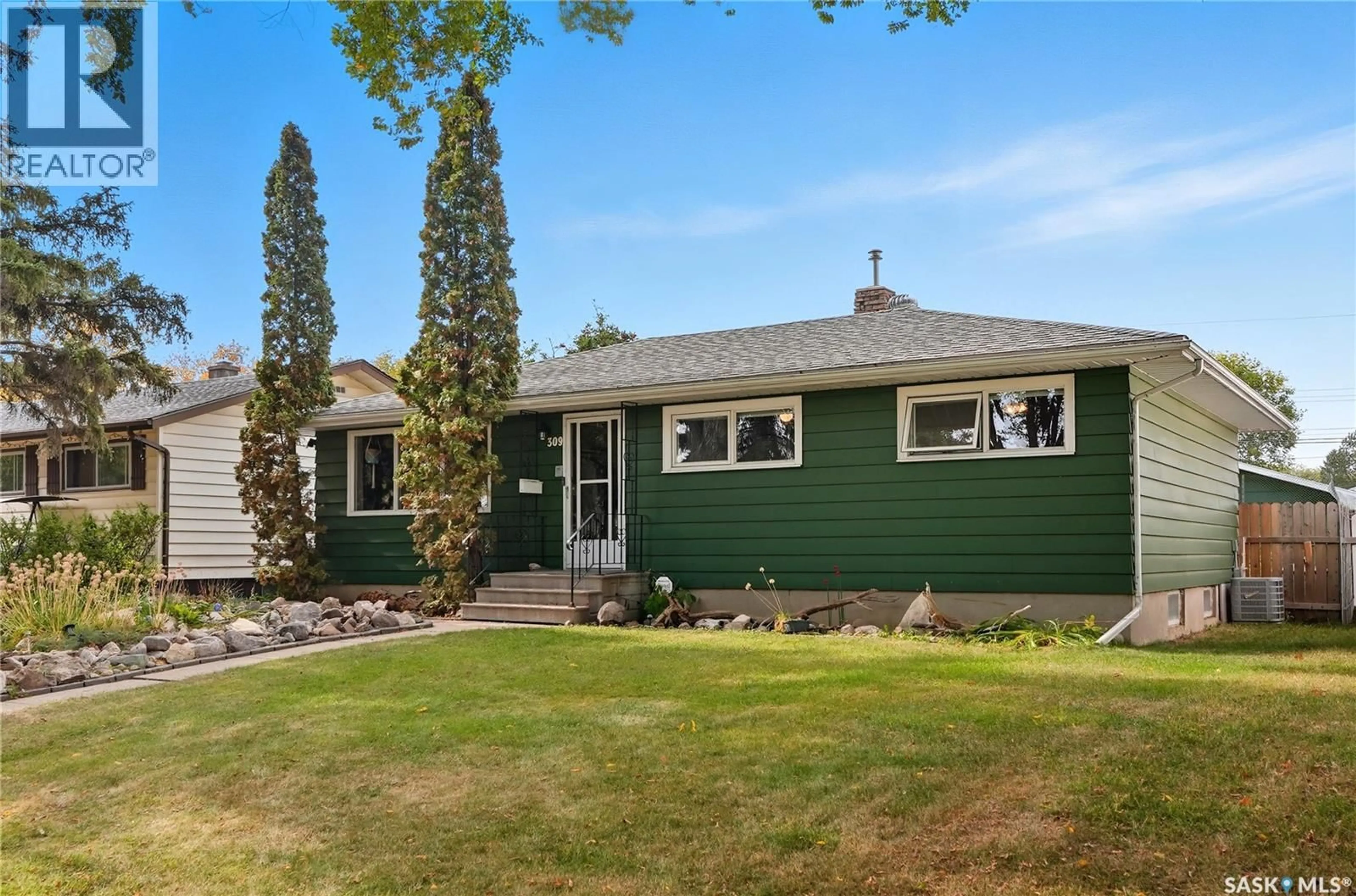 Home with vinyl exterior material, street for 309 X AVENUE, Saskatoon Saskatchewan S7L3J7