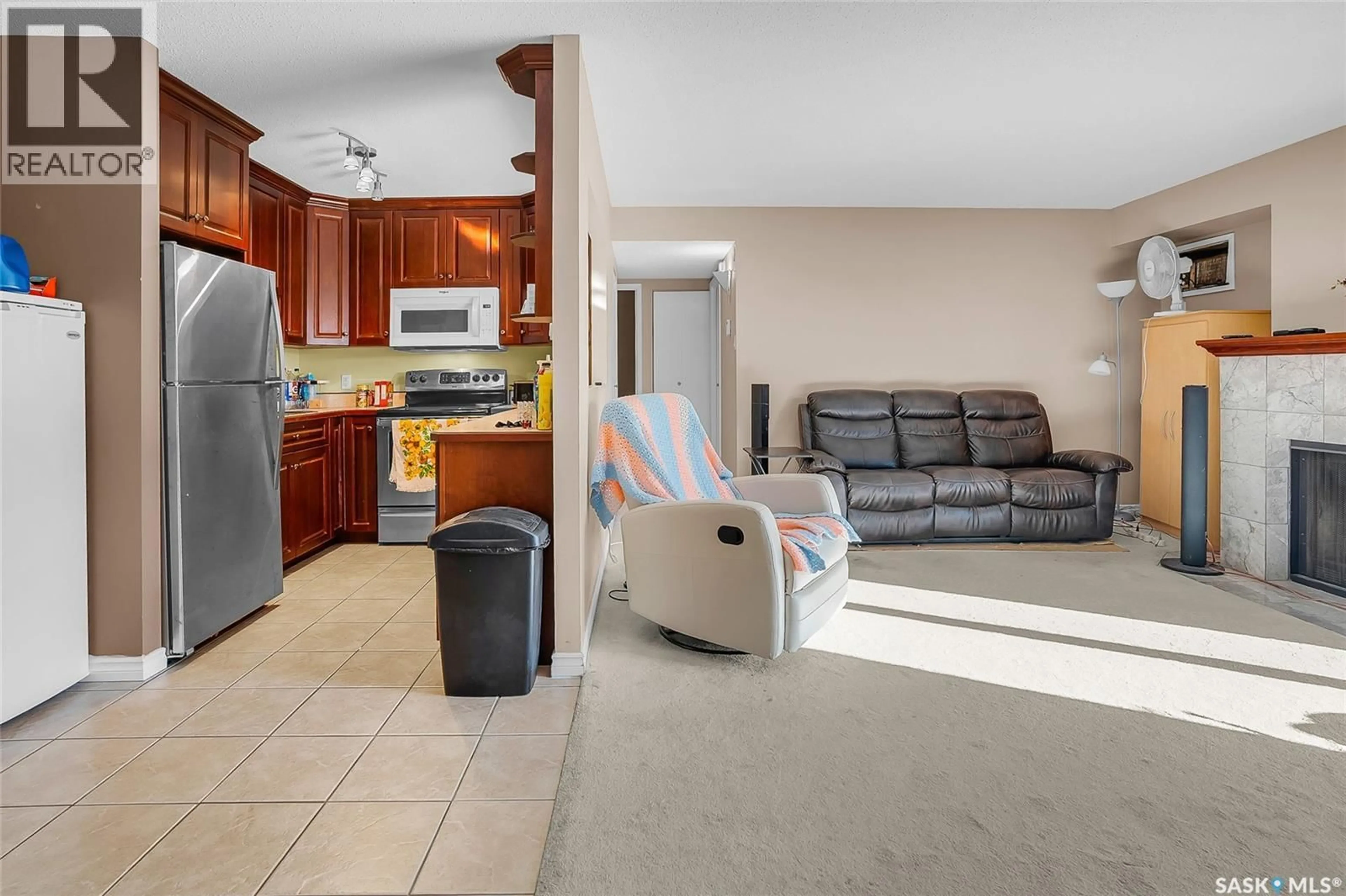 Open concept kitchen, ceramic/tile floor for 302 437 PENDYGRASSE ROAD, Saskatoon Saskatchewan S7M5C1