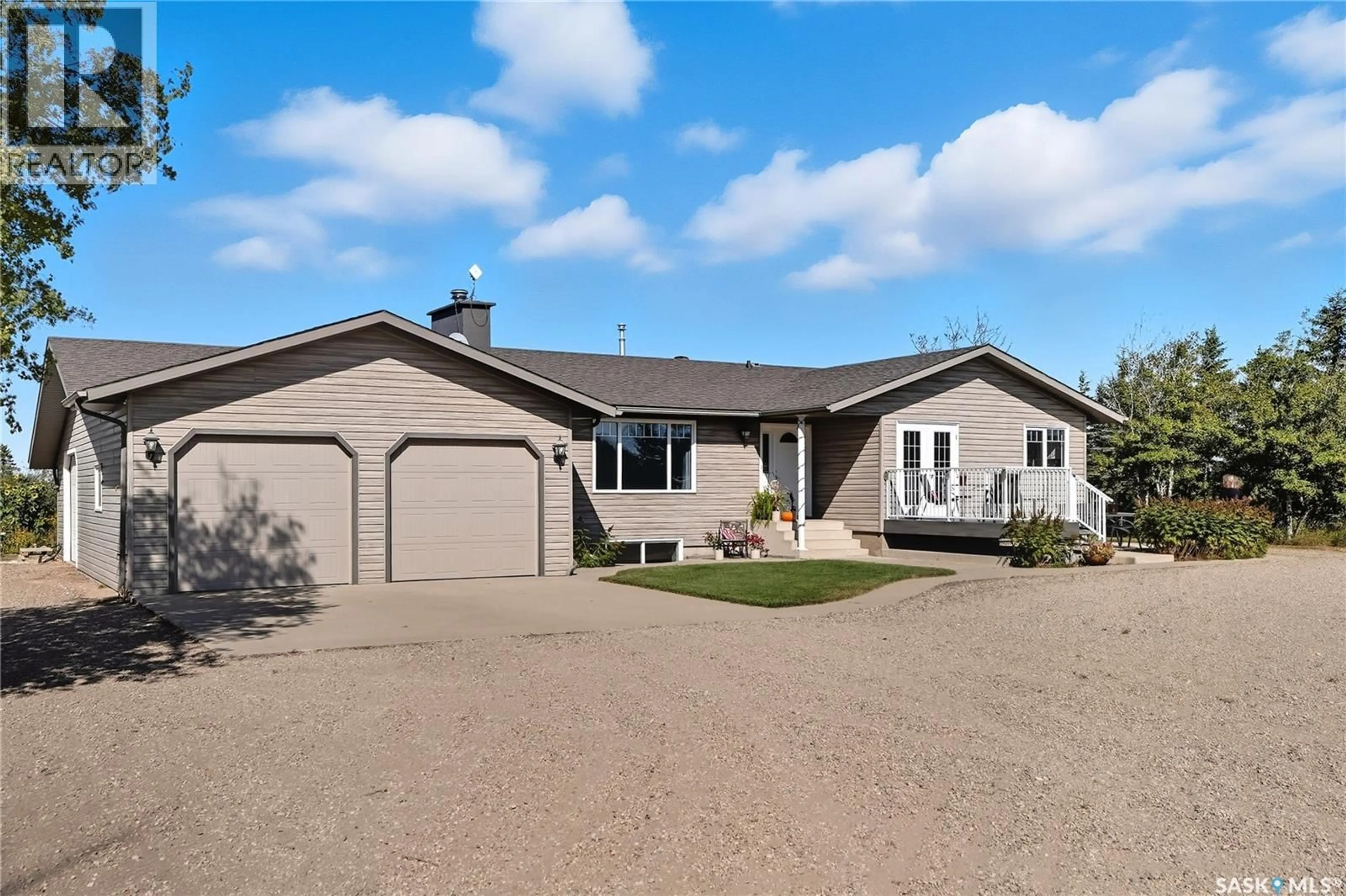 Home with vinyl exterior material, street for HAEUSLER, Corman Park Rm No. 344 Saskatchewan S7K3J5