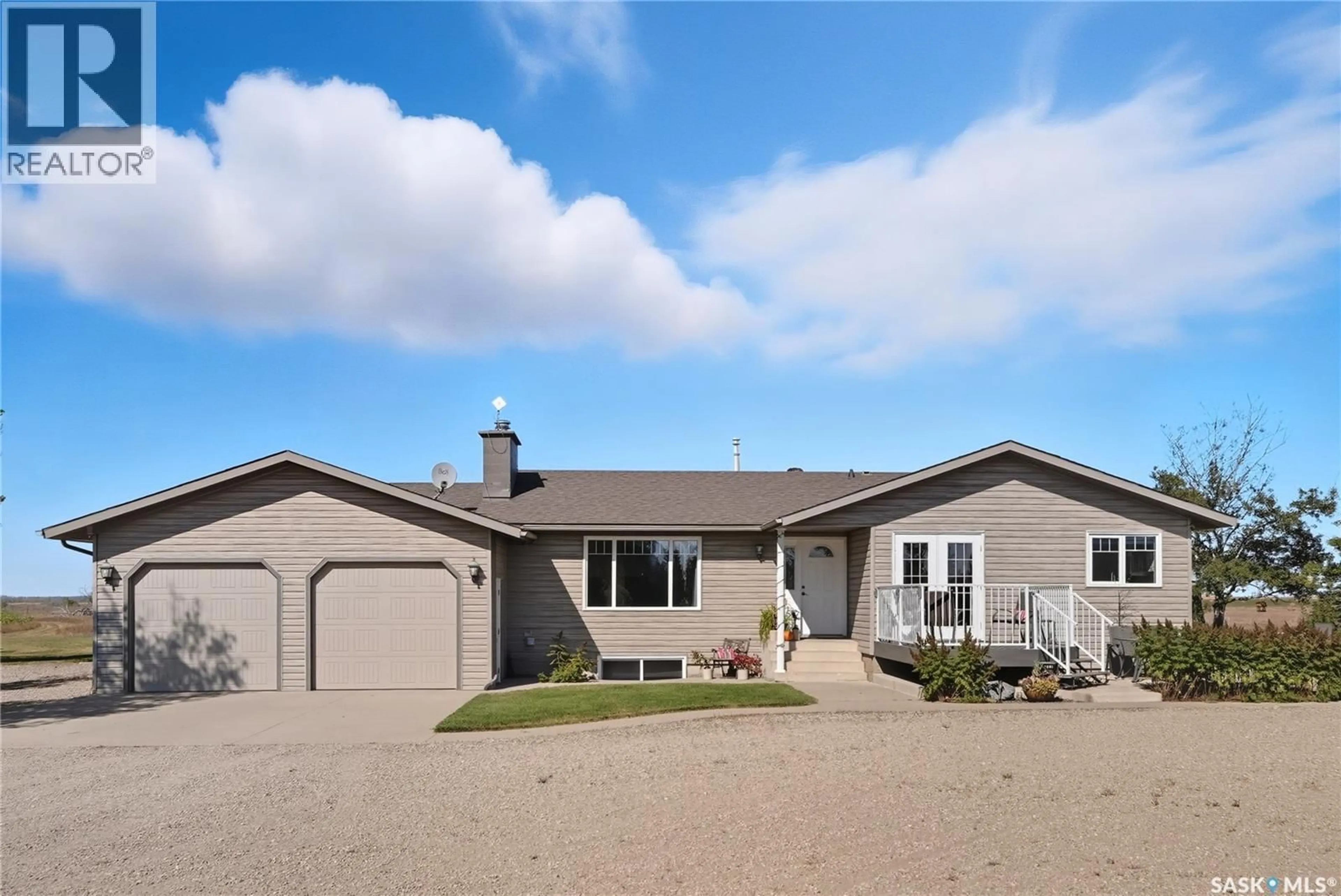 Home with vinyl exterior material, street for HAEUSLER, Corman Park Rm No. 344 Saskatchewan S7K3J5
