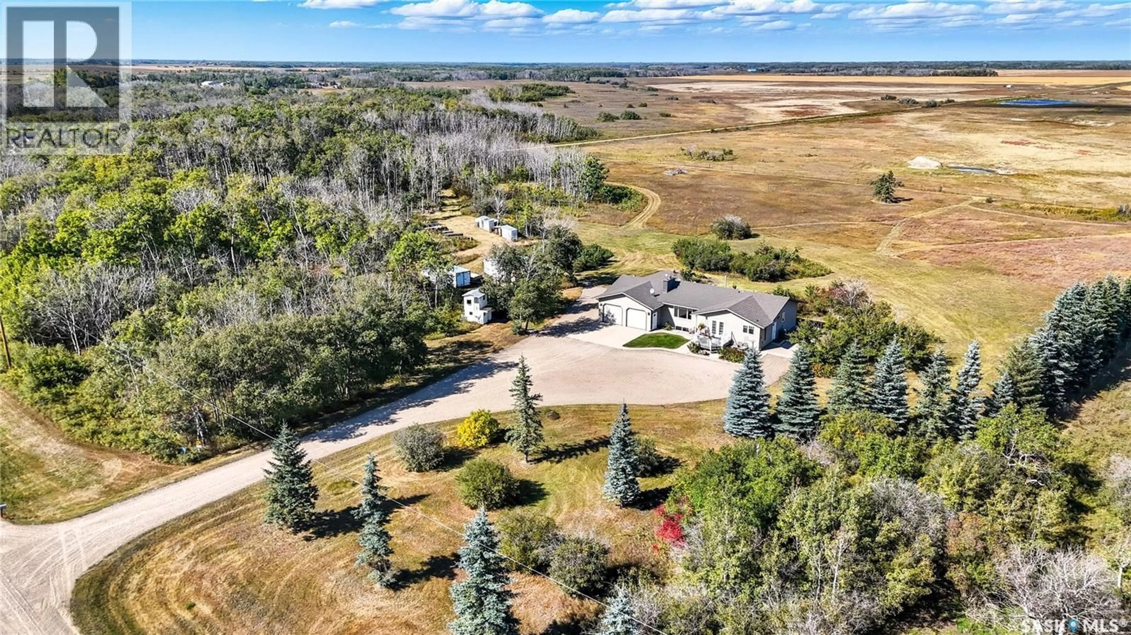 A pic from outside/outdoor area/front of a property/back of a property/a pic from drone, water/lake/river/ocean view for HAEUSLER, Corman Park Rm No. 344 Saskatchewan S7K3J5
