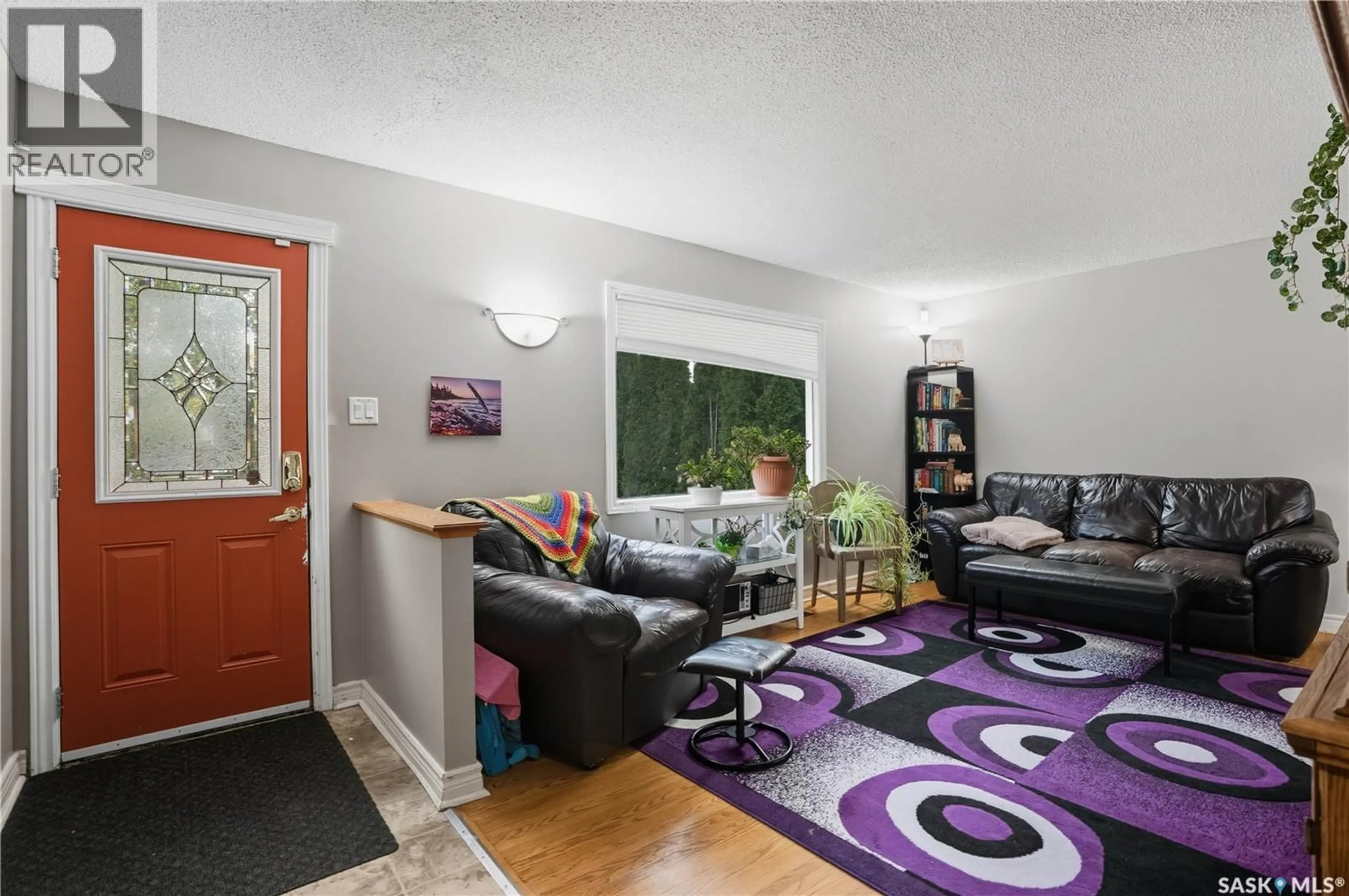 Living room with furniture, unknown for 923 L AVENUE, Saskatoon Saskatchewan S7N2R5