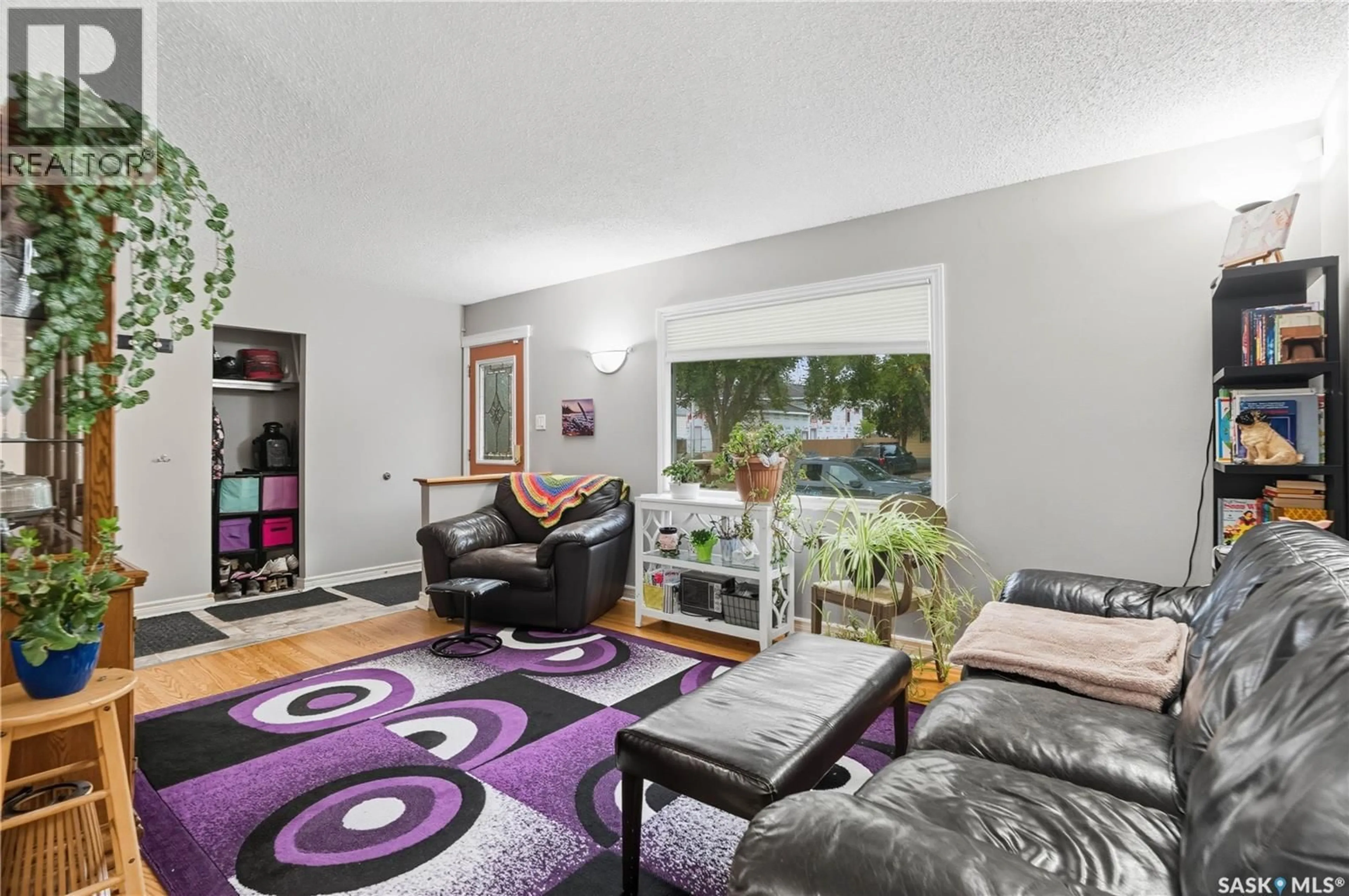 Living room with furniture, unknown for 923 L AVENUE, Saskatoon Saskatchewan S7N2R5