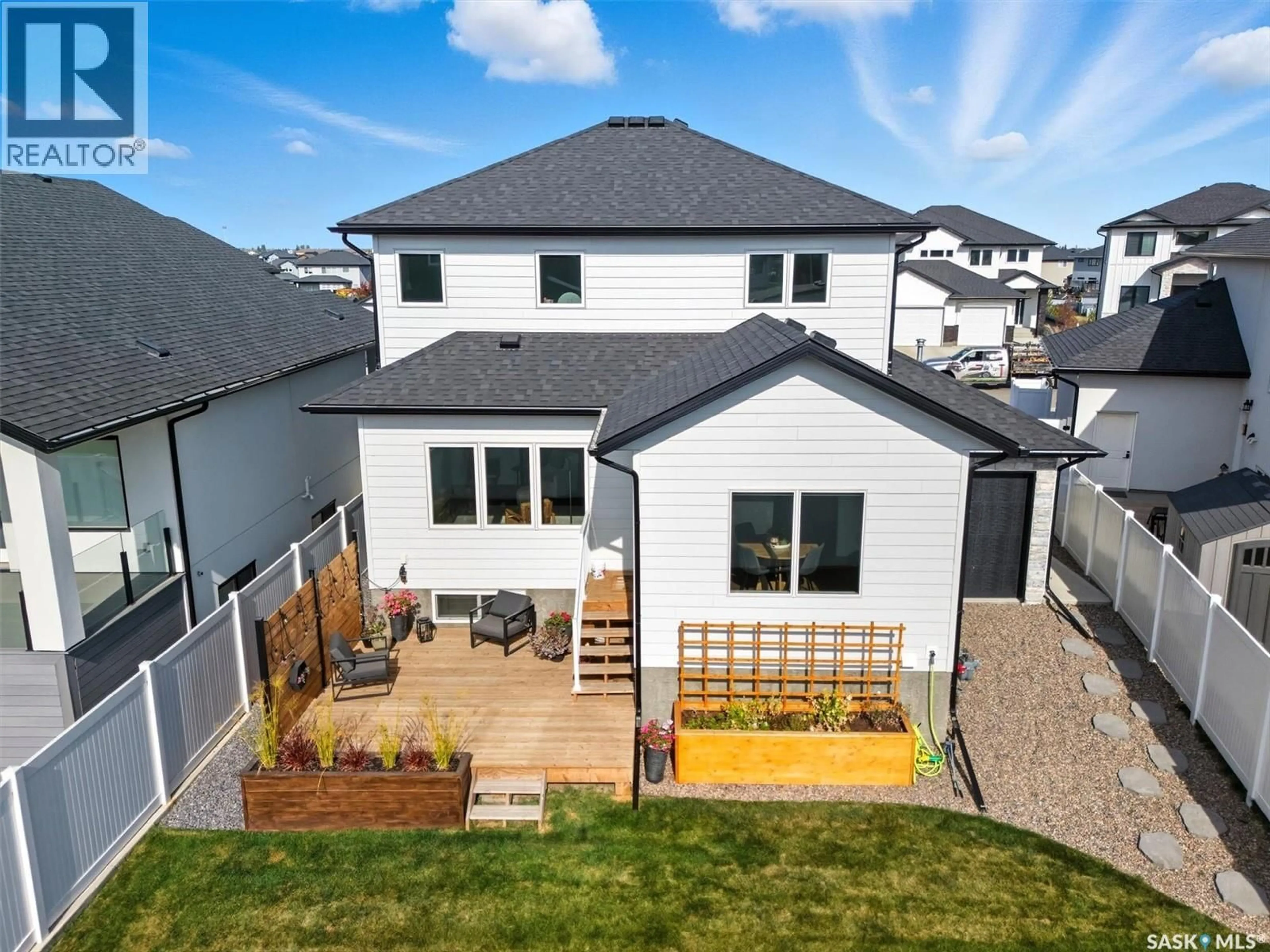 A pic from outside/outdoor area/front of a property/back of a property/a pic from drone, mountain view for 518 HAMM CRESCENT, Saskatoon Saskatchewan S7V0Z2