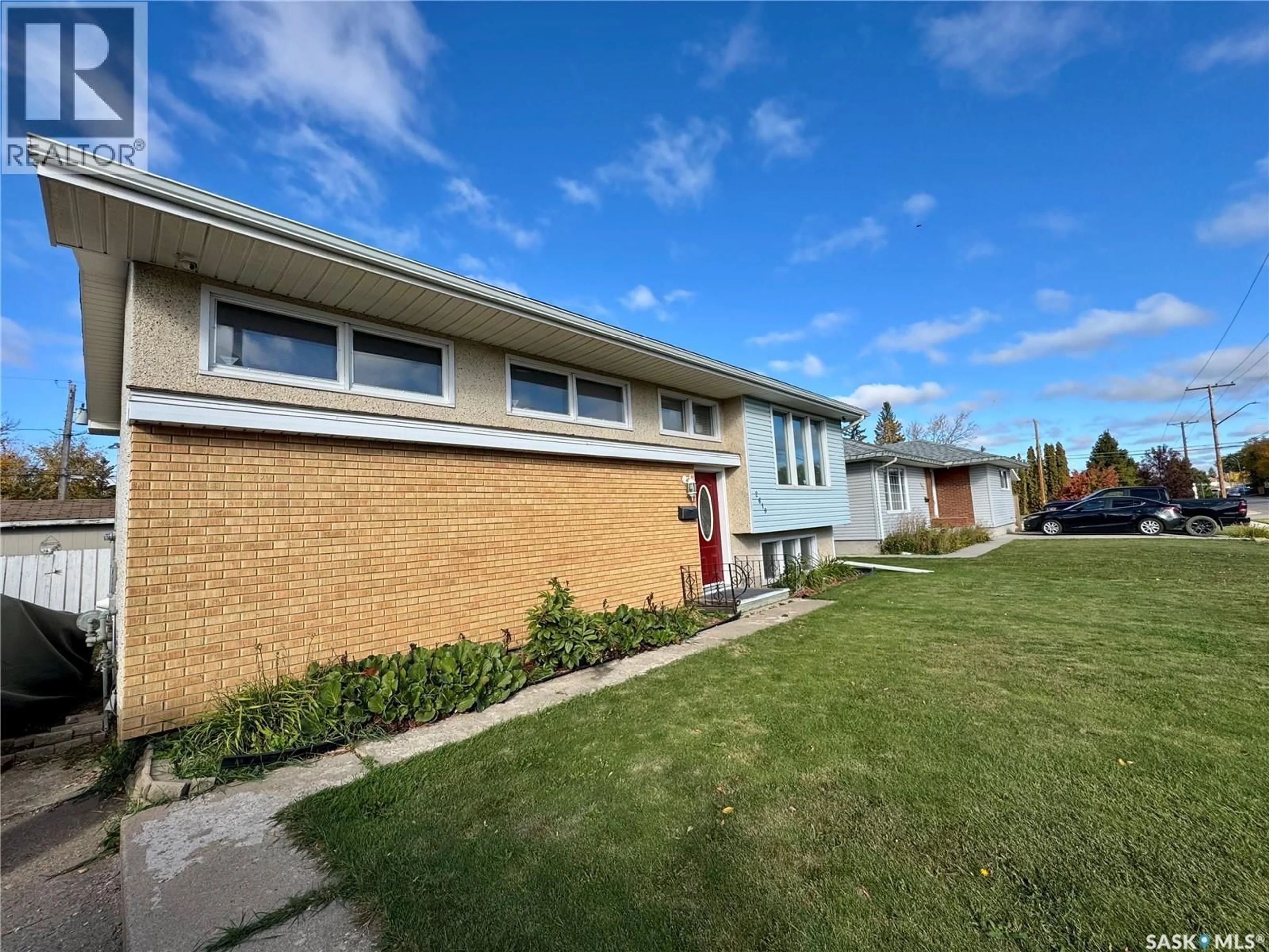 Home with brick exterior material, street for 2619 6TH AVENUE, Prince Albert Saskatchewan S6V5L4