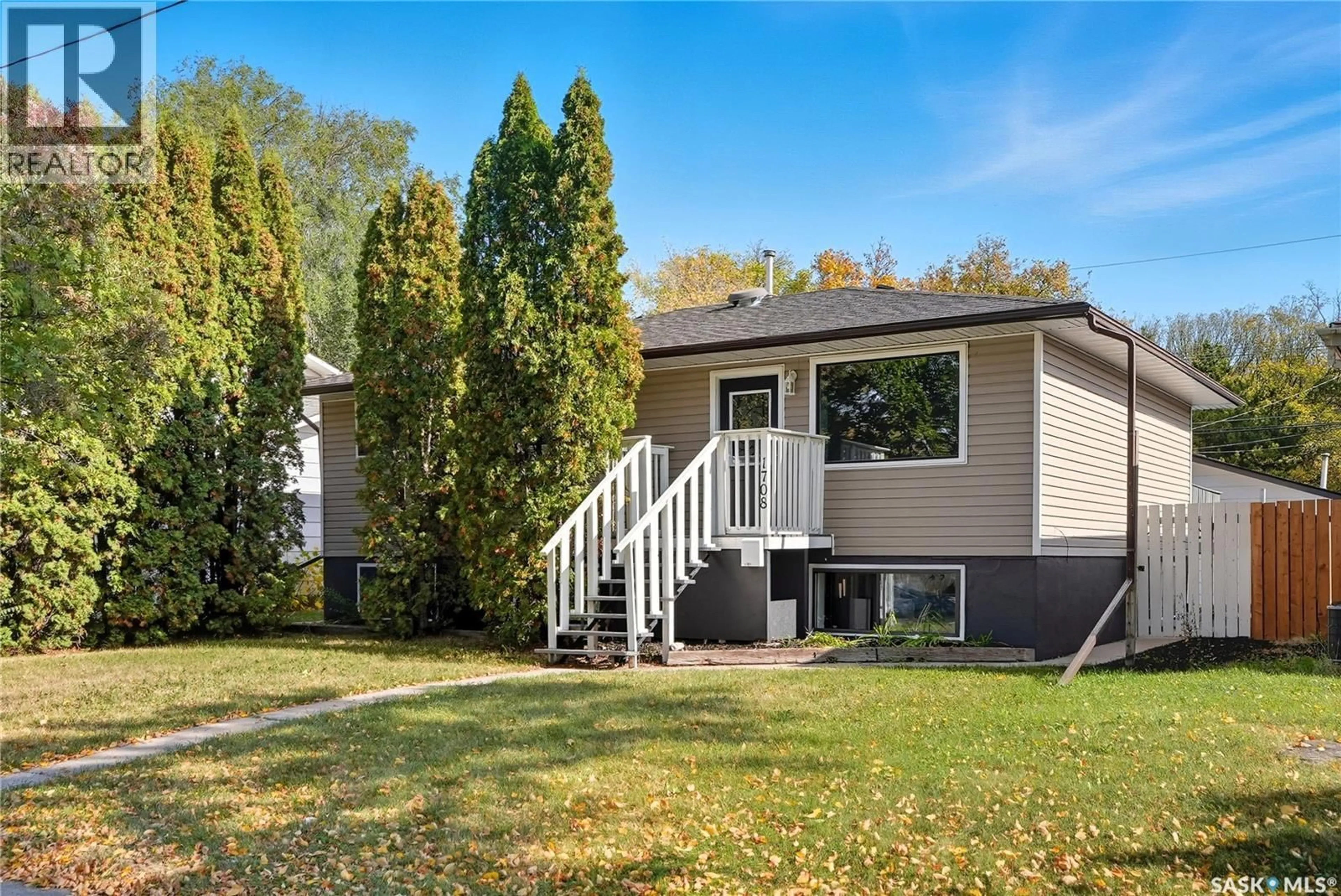 Home with vinyl exterior material, street for 1708 2ND AVENUE, Saskatoon Saskatchewan S7K2G5