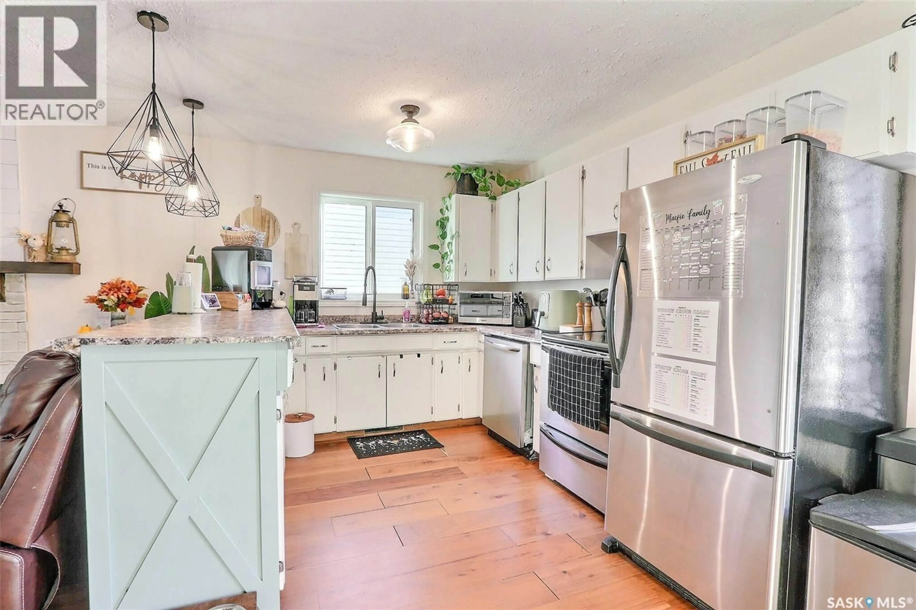 Open concept kitchen, ceramic/tile floor for 21 MAPLE PLACE, Birch Hills Saskatchewan S0J0G0