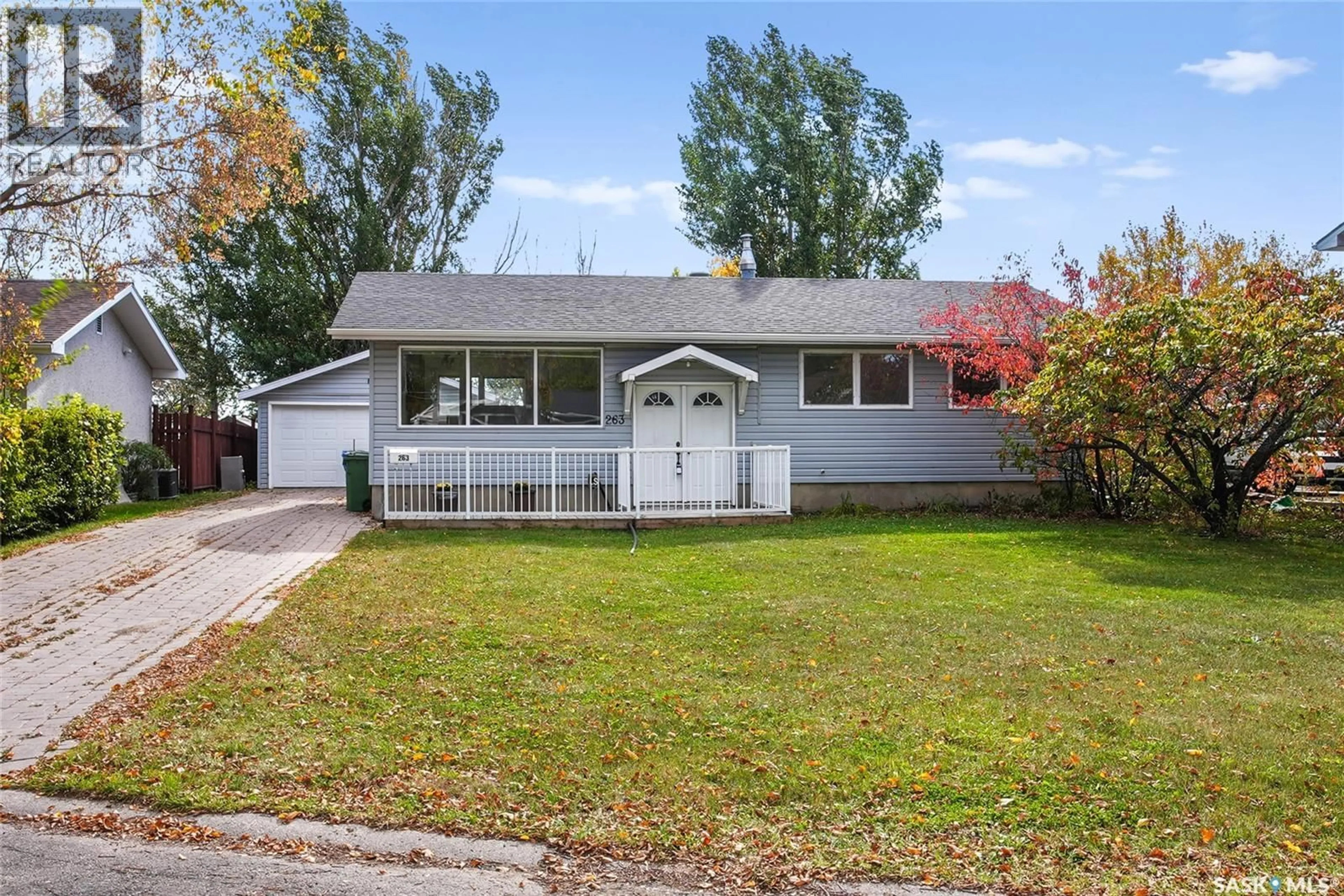 Home with vinyl exterior material, street for 263 LOGAN CRESCENT, Regina Saskatchewan S4S5S8
