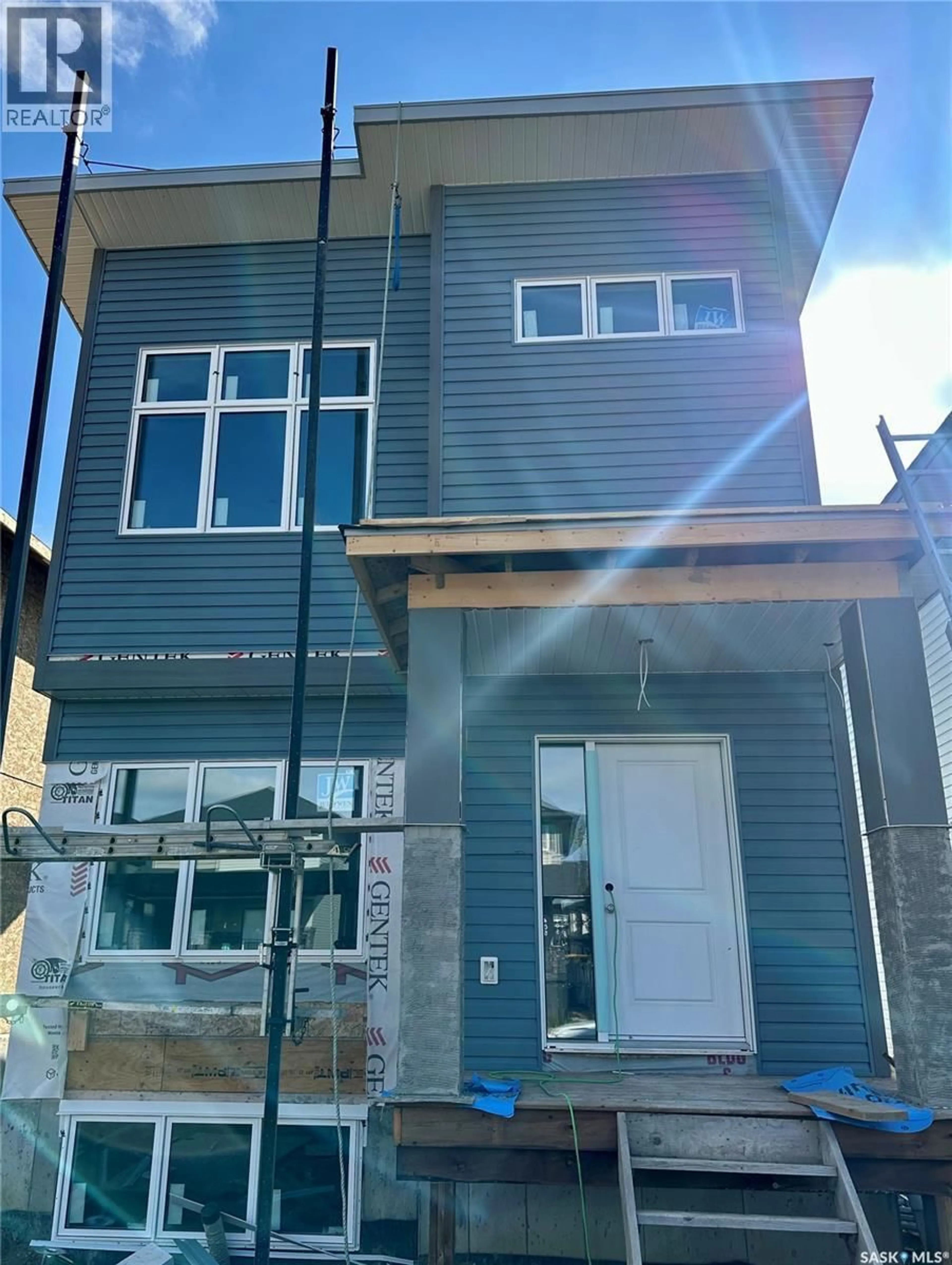 Home with vinyl exterior material, street for 1404 BESNARD DRIVE, Martensville Saskatchewan S0K2T1