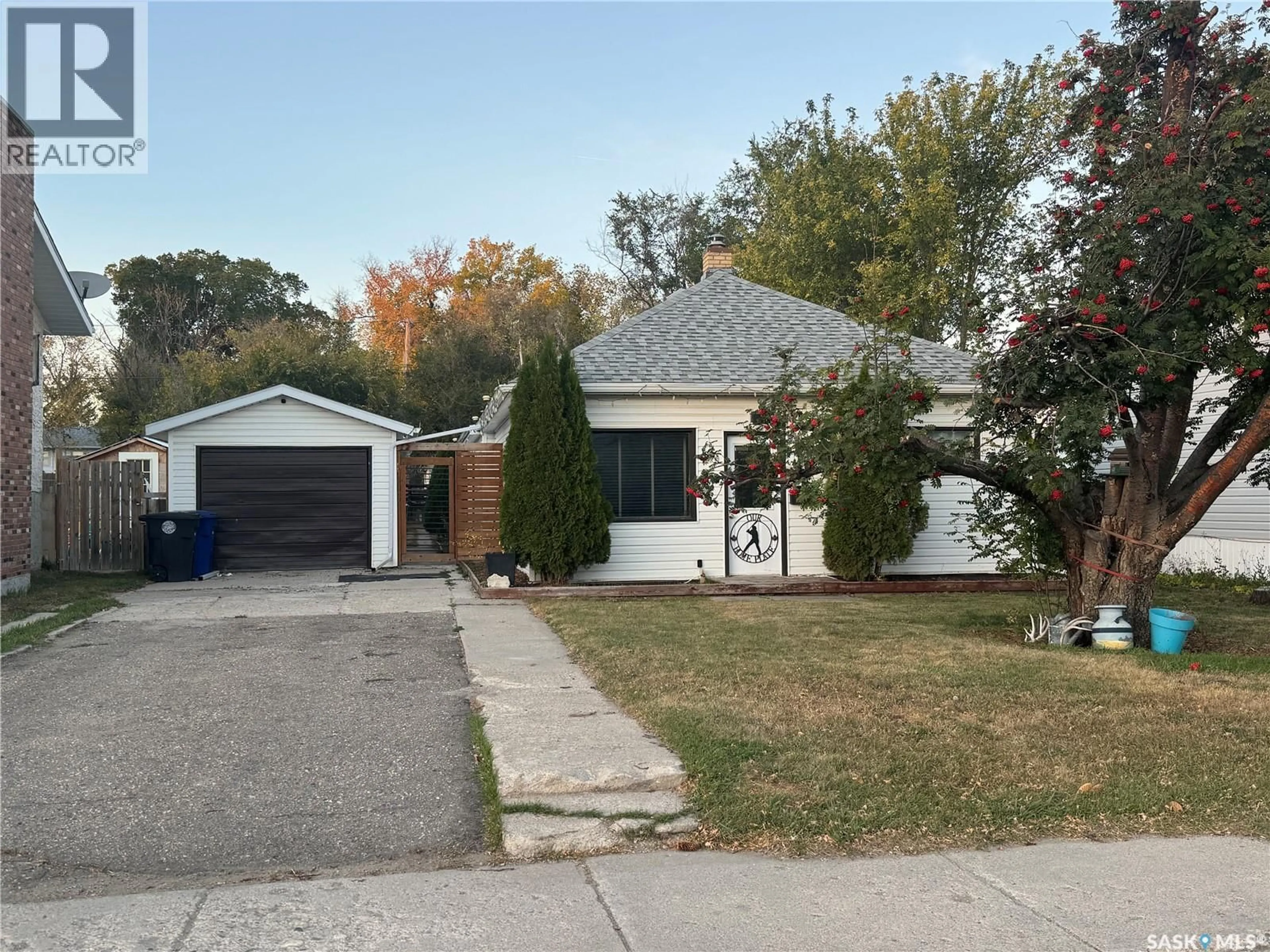 Home with brick exterior material, street for 307 6TH AVENUE, Biggar Saskatchewan S0K0M0
