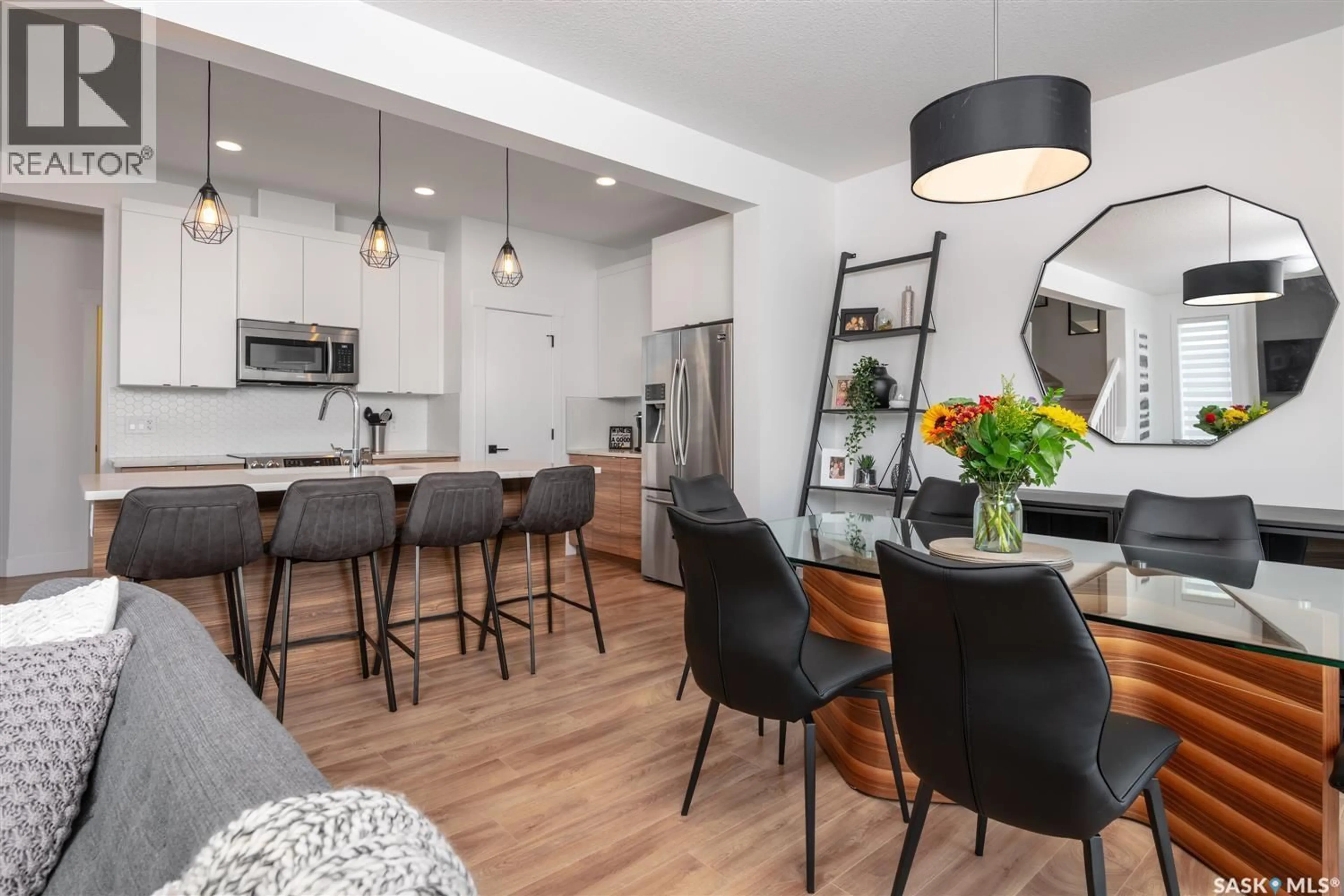 Open concept kitchen, wood/laminate floor for 2912 WELBY WAY, Regina Saskatchewan S4V4A2