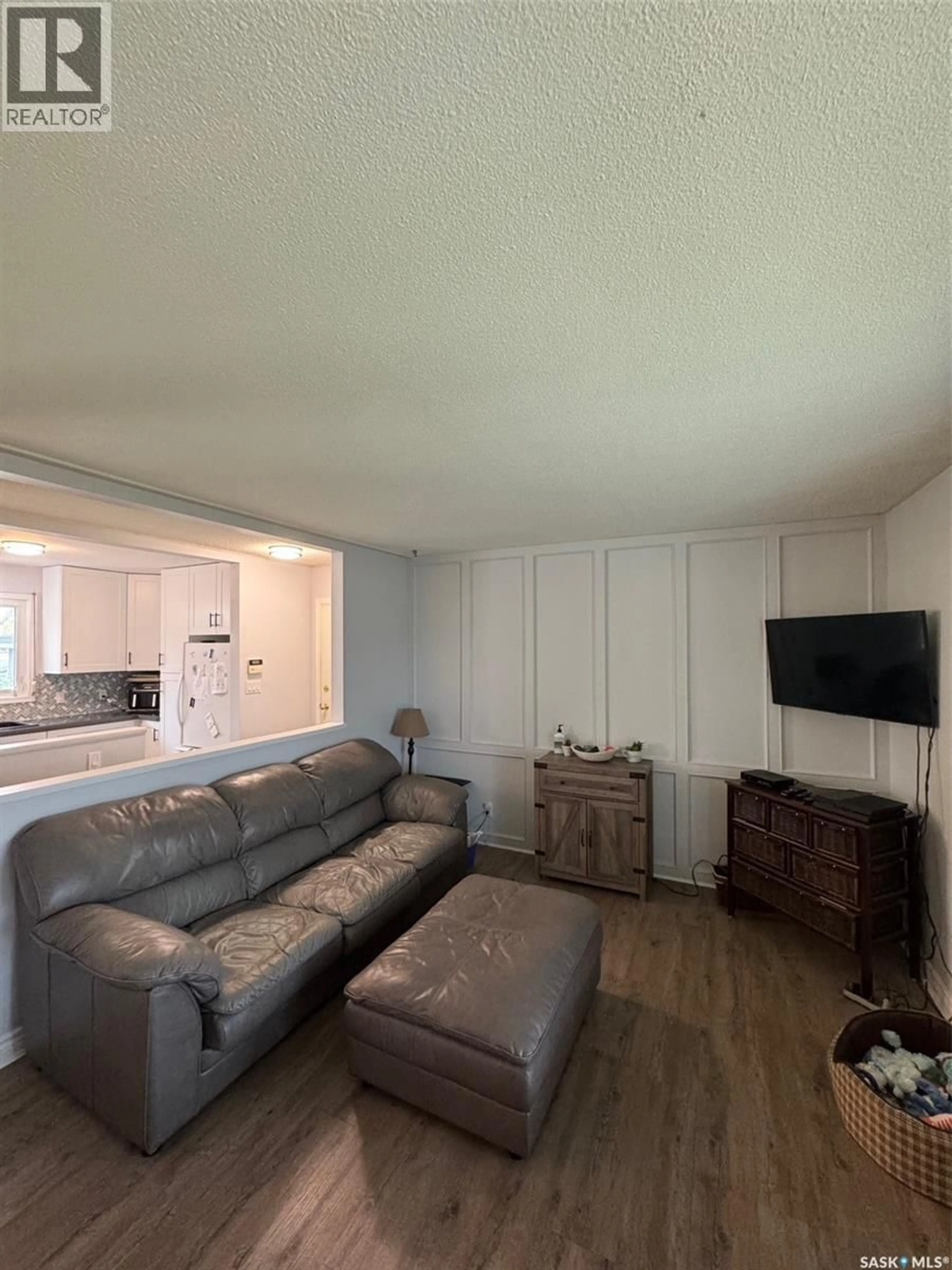 Living room with furniture, unknown for 1811 91ST STREET, North Battleford Saskatchewan S9A0A6