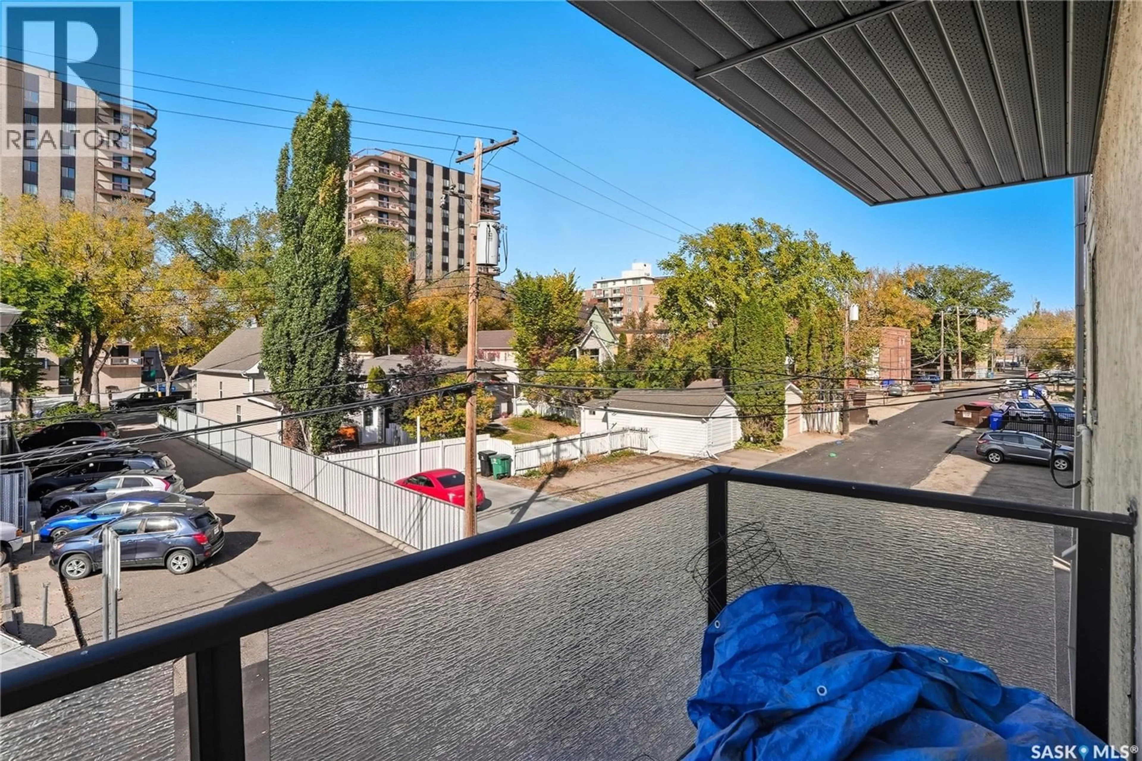 Balcony in the apartment, city buildings view from balcony for N - 304 423 4TH AVENUE, Saskatoon Saskatchewan S7K2M4