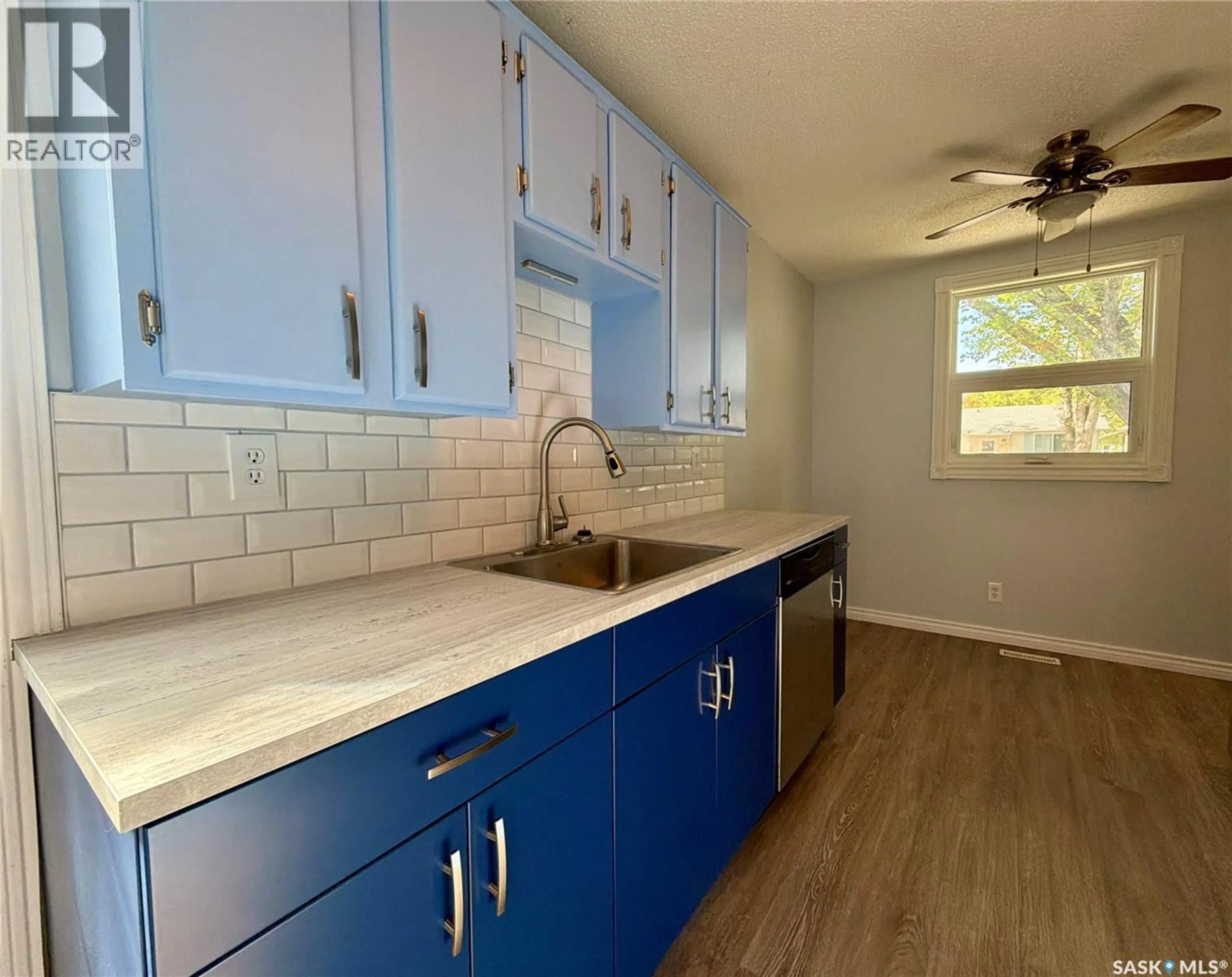 Open concept kitchen, ceramic/tile floor for 15 MARSHALL CRESCENT, Regina Saskatchewan S4R4Y8