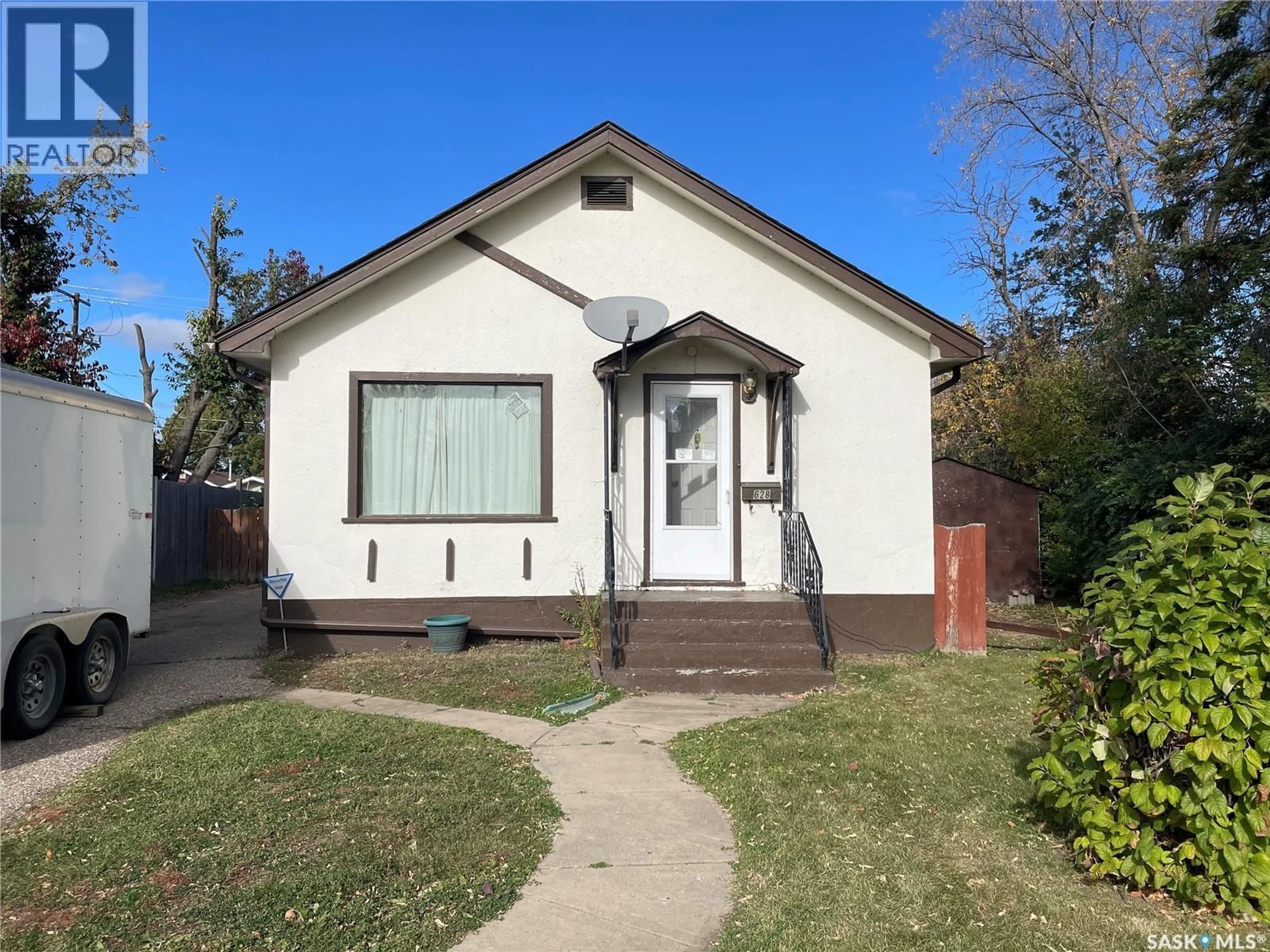 Home with brick exterior material, street for 628 5TH STREET, Prince Albert Saskatchewan S6V0M2