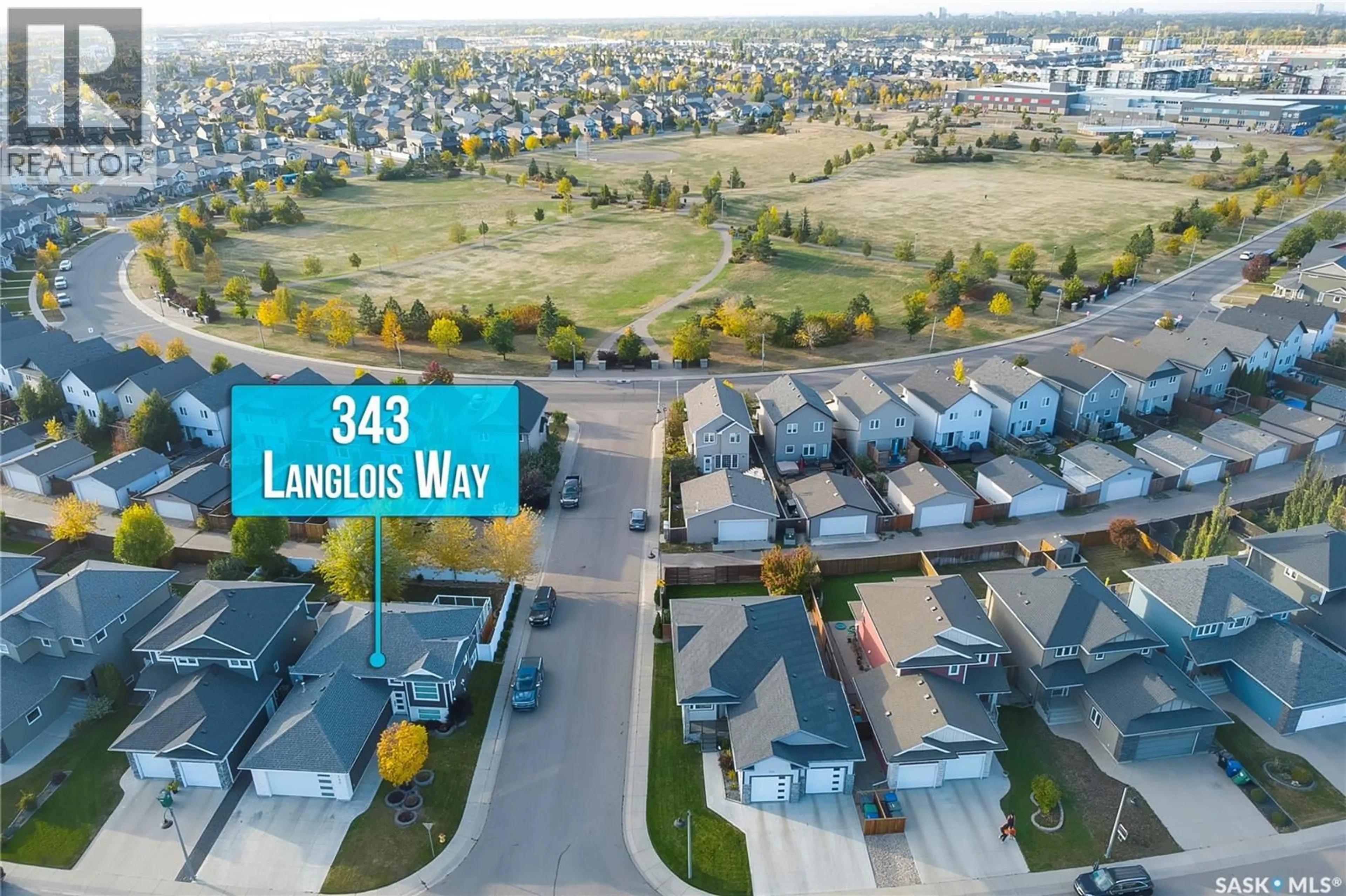 A pic from outside/outdoor area/front of a property/back of a property/a pic from drone, street for 343 LANGLOIS WAY, Saskatoon Saskatchewan S7T1C9