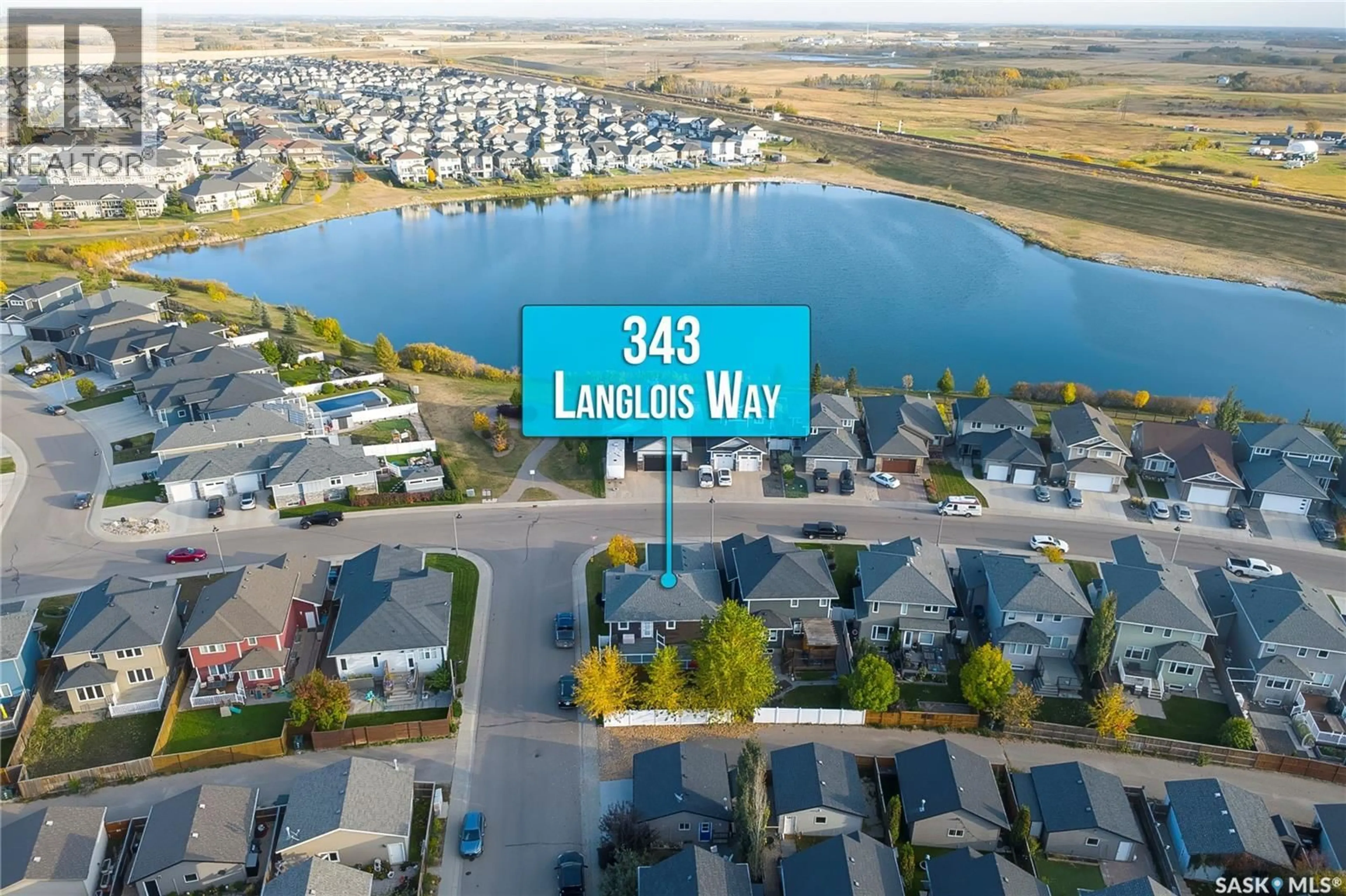 A pic from outside/outdoor area/front of a property/back of a property/a pic from drone, water/lake/river/ocean view for 343 LANGLOIS WAY, Saskatoon Saskatchewan S7T1C9