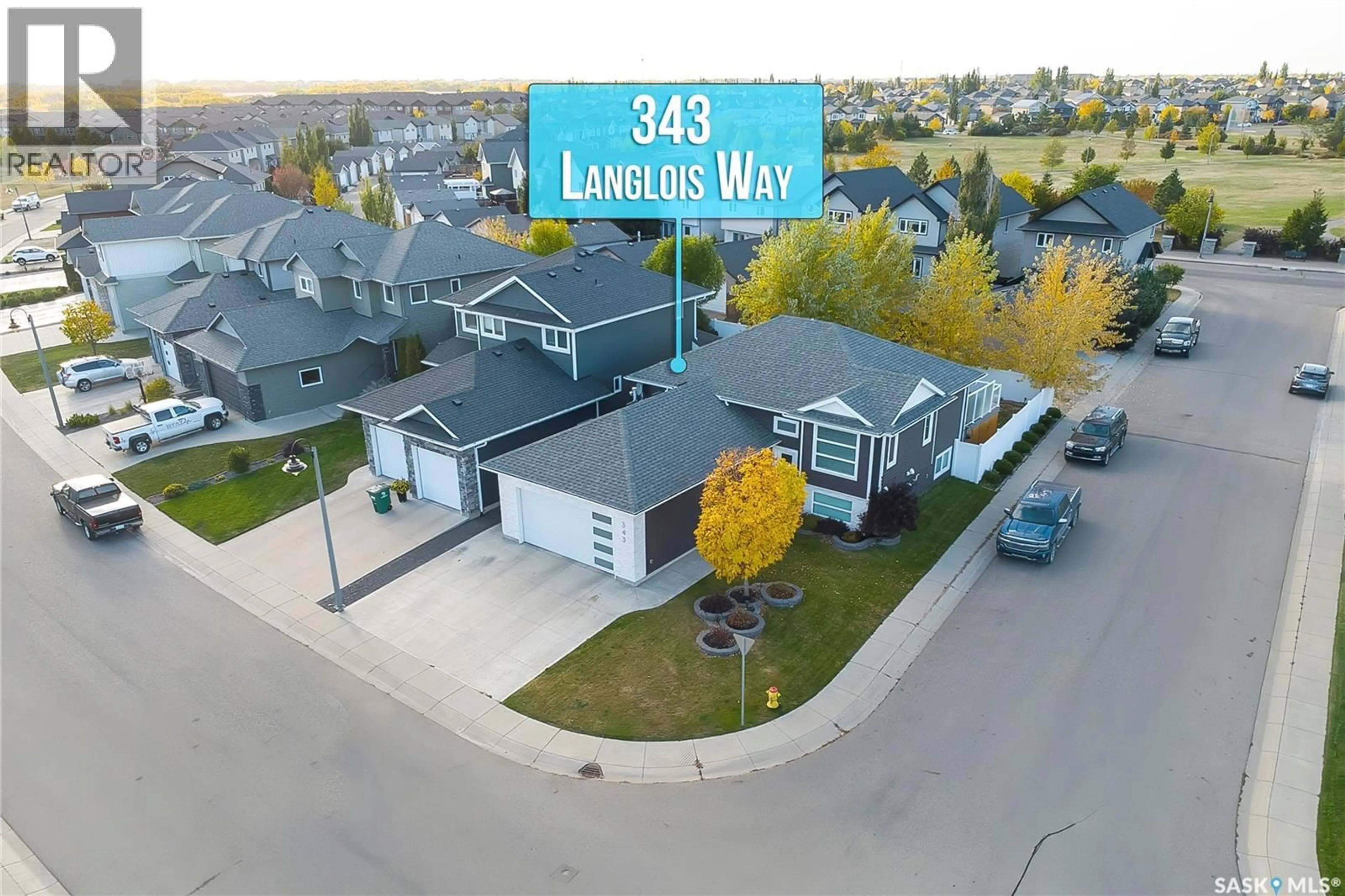 A pic from outside/outdoor area/front of a property/back of a property/a pic from drone, street for 343 LANGLOIS WAY, Saskatoon Saskatchewan S7T1C9