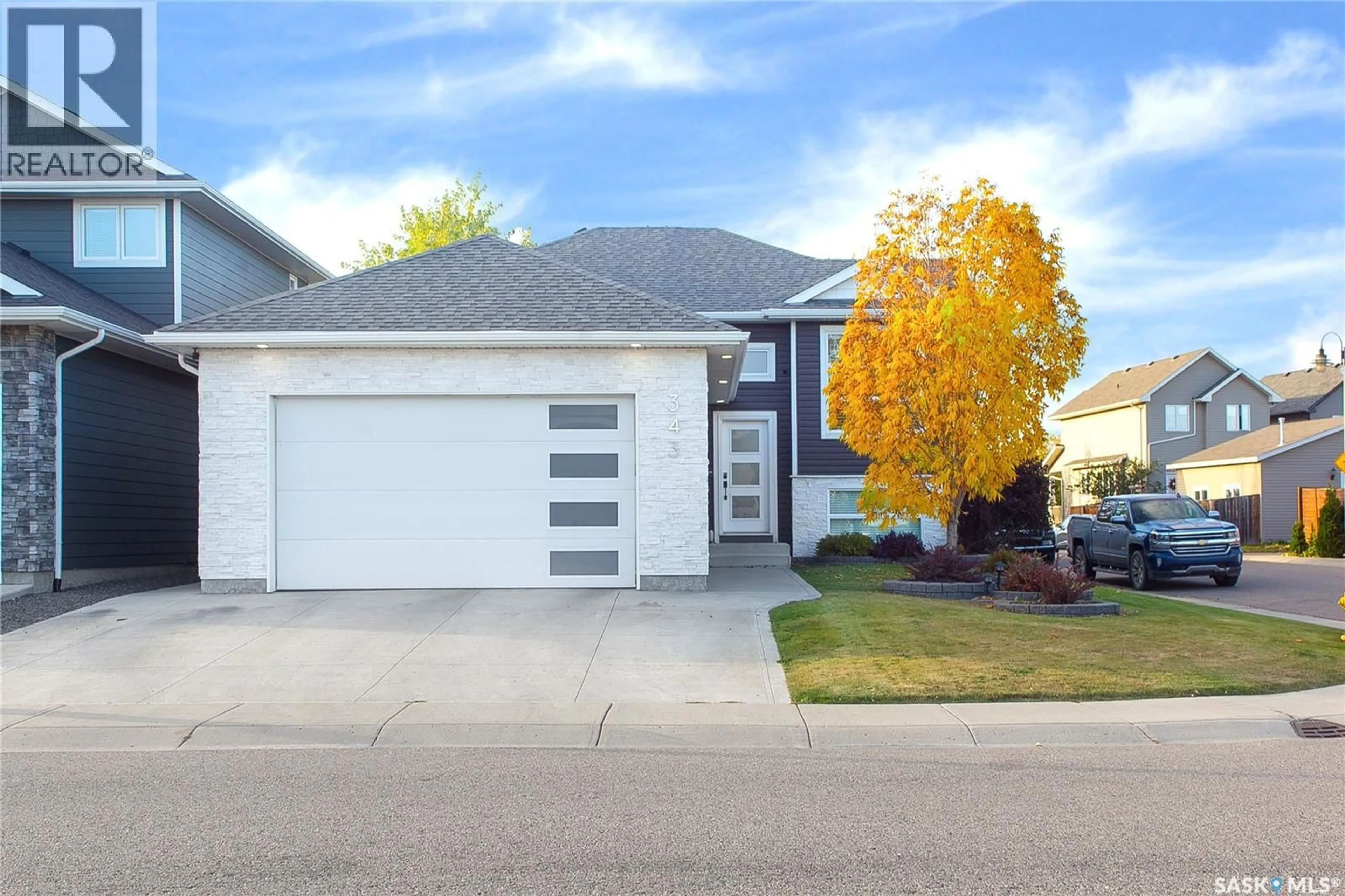 Home with vinyl exterior material, street for 343 LANGLOIS WAY, Saskatoon Saskatchewan S7T1C9