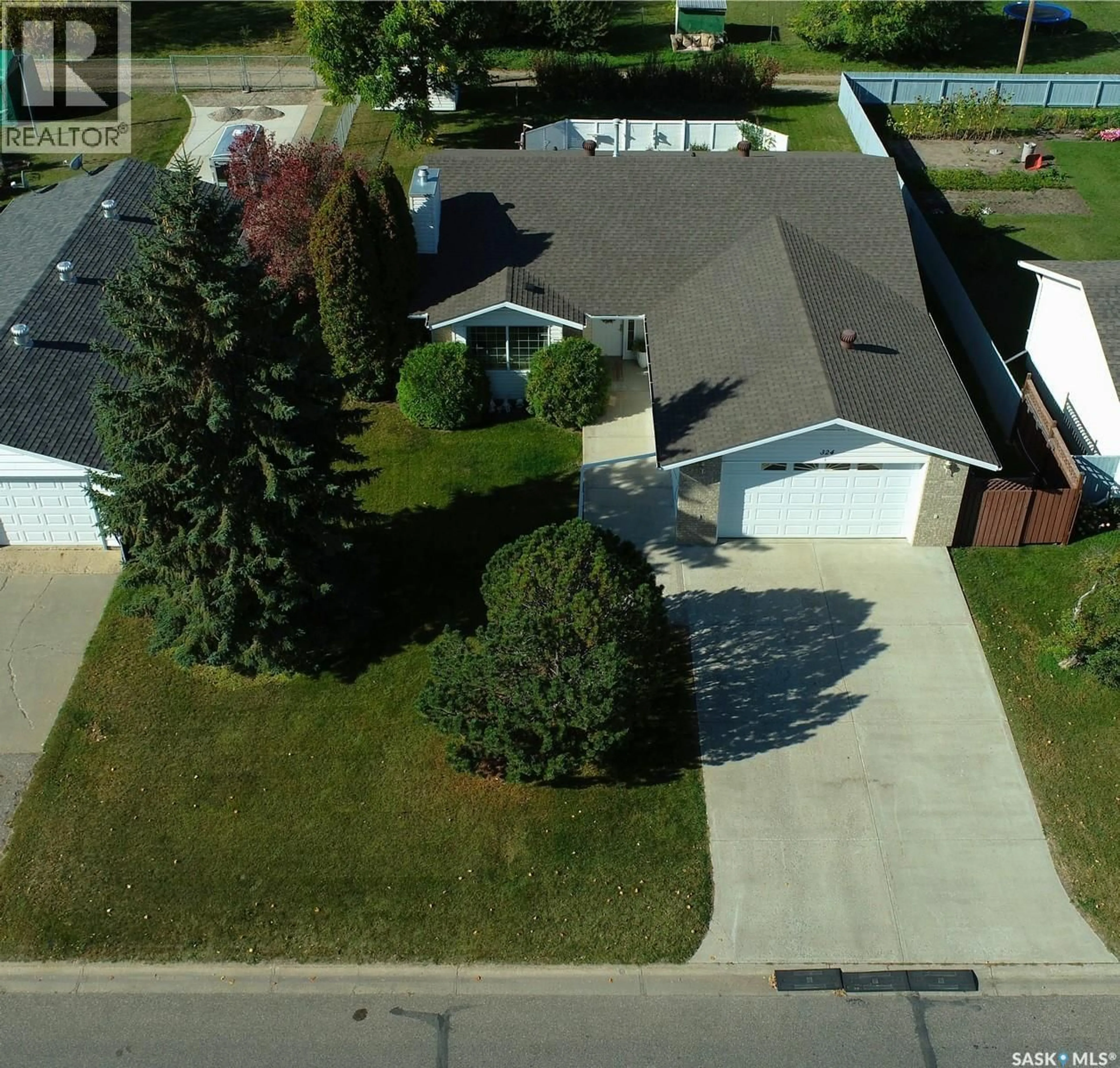 A pic from outside/outdoor area/front of a property/back of a property/a pic from drone, street for 324 5TH STREET, Nipawin Saskatchewan S0E1E0