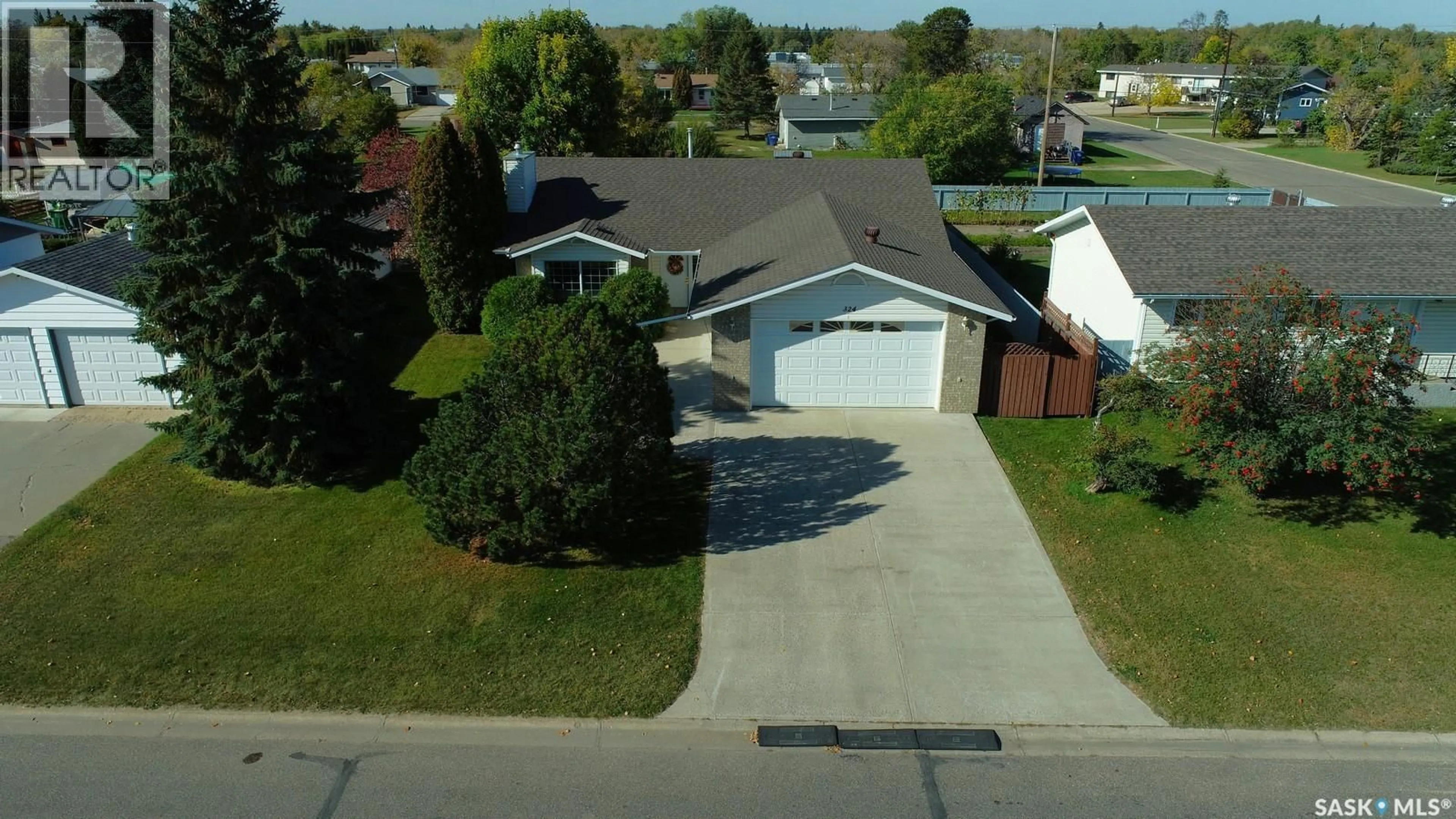 A pic from outside/outdoor area/front of a property/back of a property/a pic from drone, street for 324 5TH STREET, Nipawin Saskatchewan S0E1E0