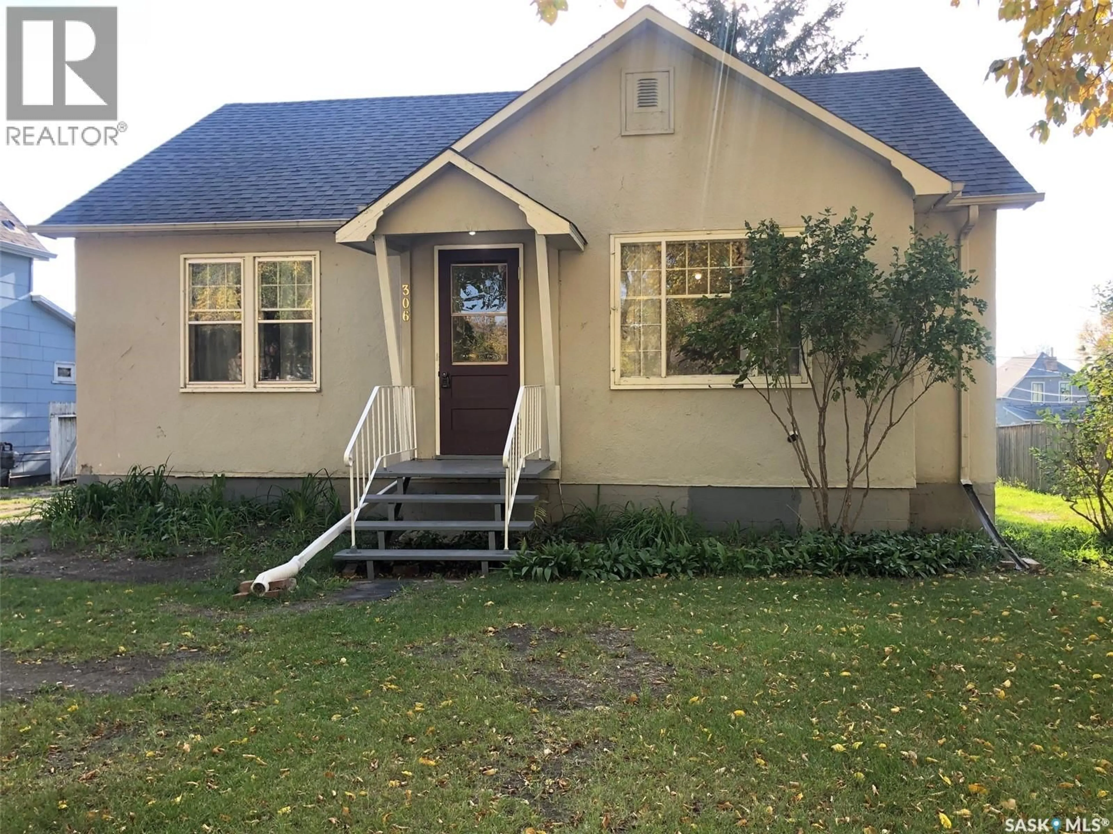 Home with vinyl exterior material, street for 306 COTTER STREET, Kamsack Saskatchewan S0A1S0