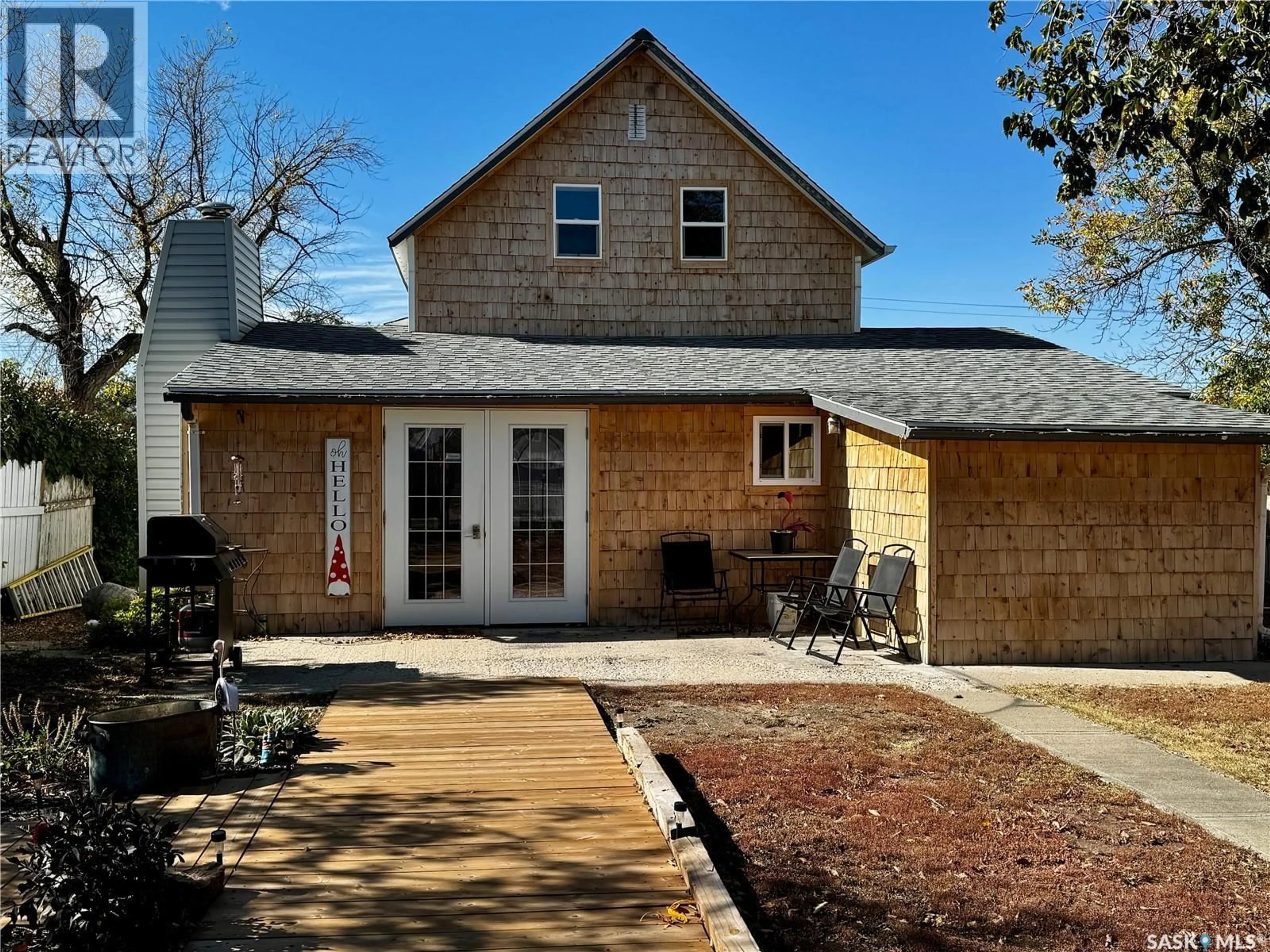 Home with brick exterior material, street for 135 6TH AVENUE, Swift Current Saskatchewan S9H0L7