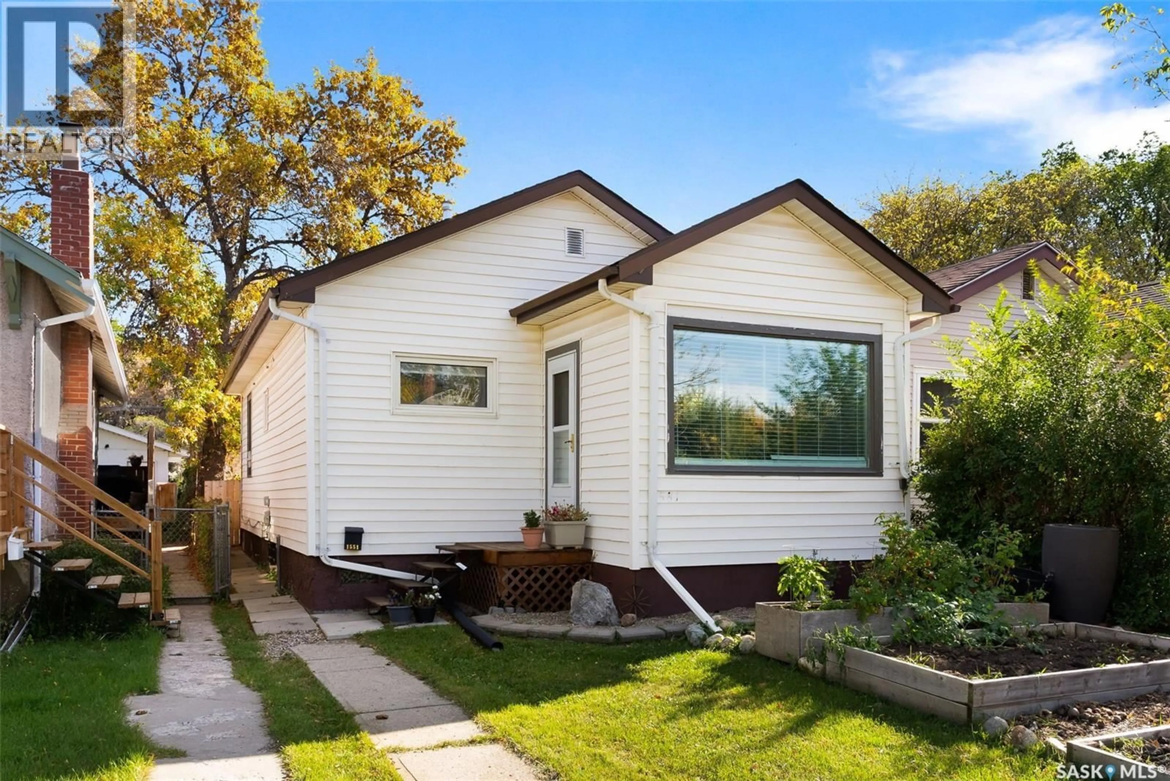 Home with vinyl exterior material, street for 1551 MONTAGUE STREET, Regina Saskatchewan S4T3J4