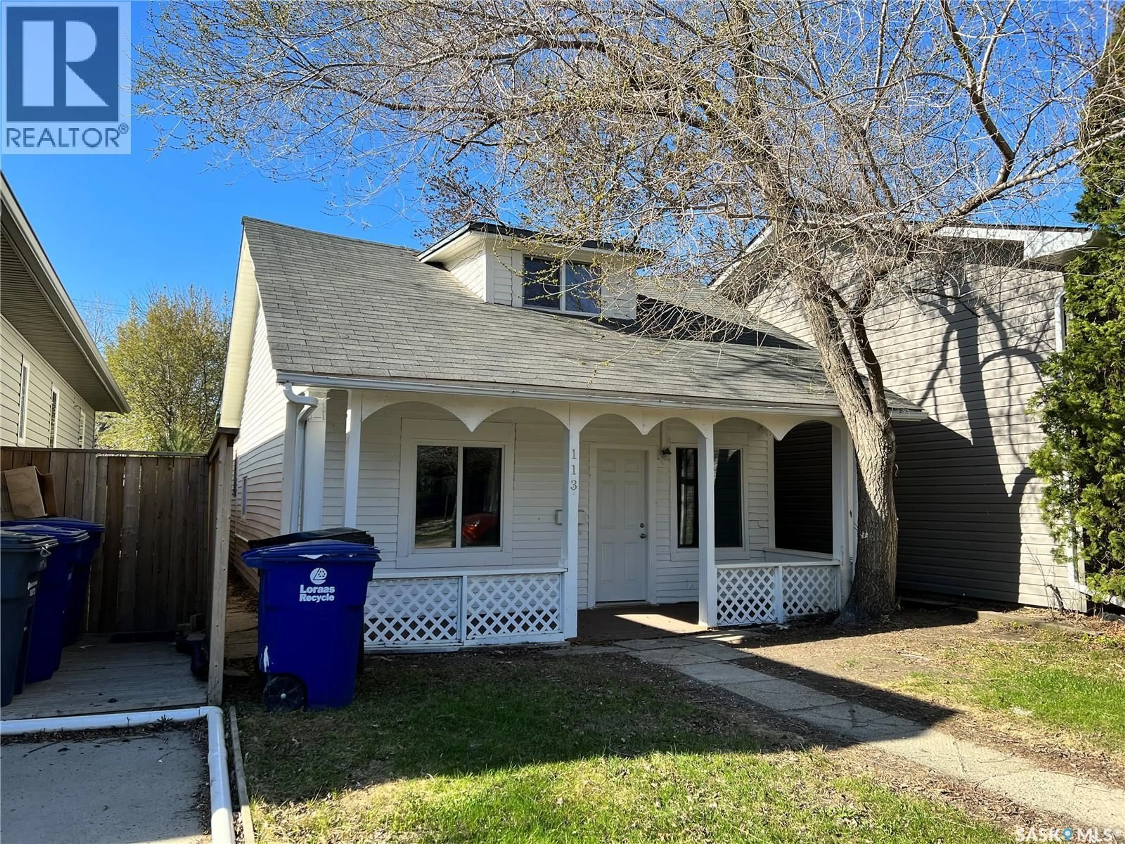 Home with vinyl exterior material, street for E - 113 109TH STREET, Saskatoon Saskatchewan S7N1R3