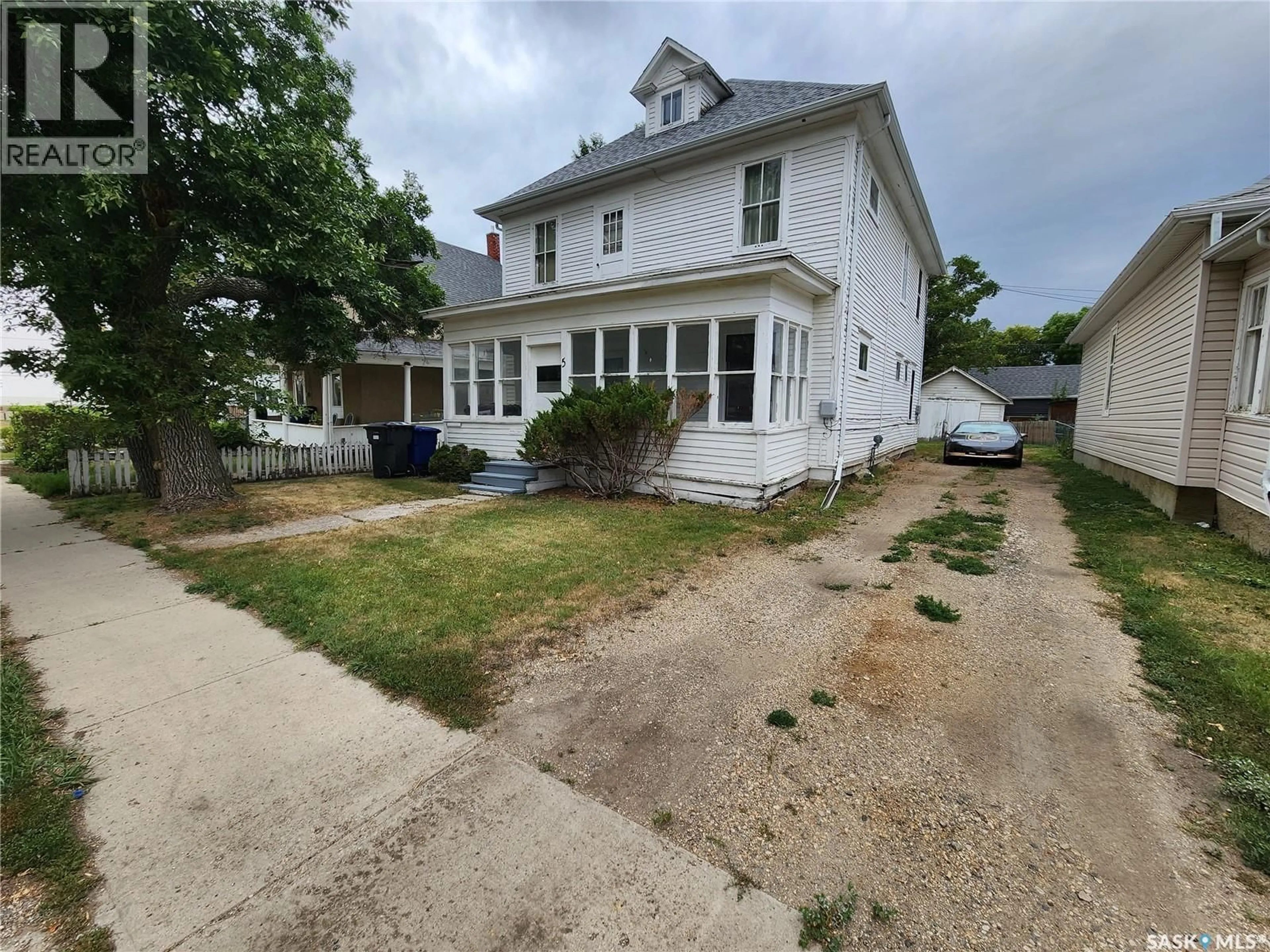 A pic from outside/outdoor area/front of a property/back of a property/a pic from drone, street for 5 PRAIRIE AVENUE, Weyburn Saskatchewan S4H0K9