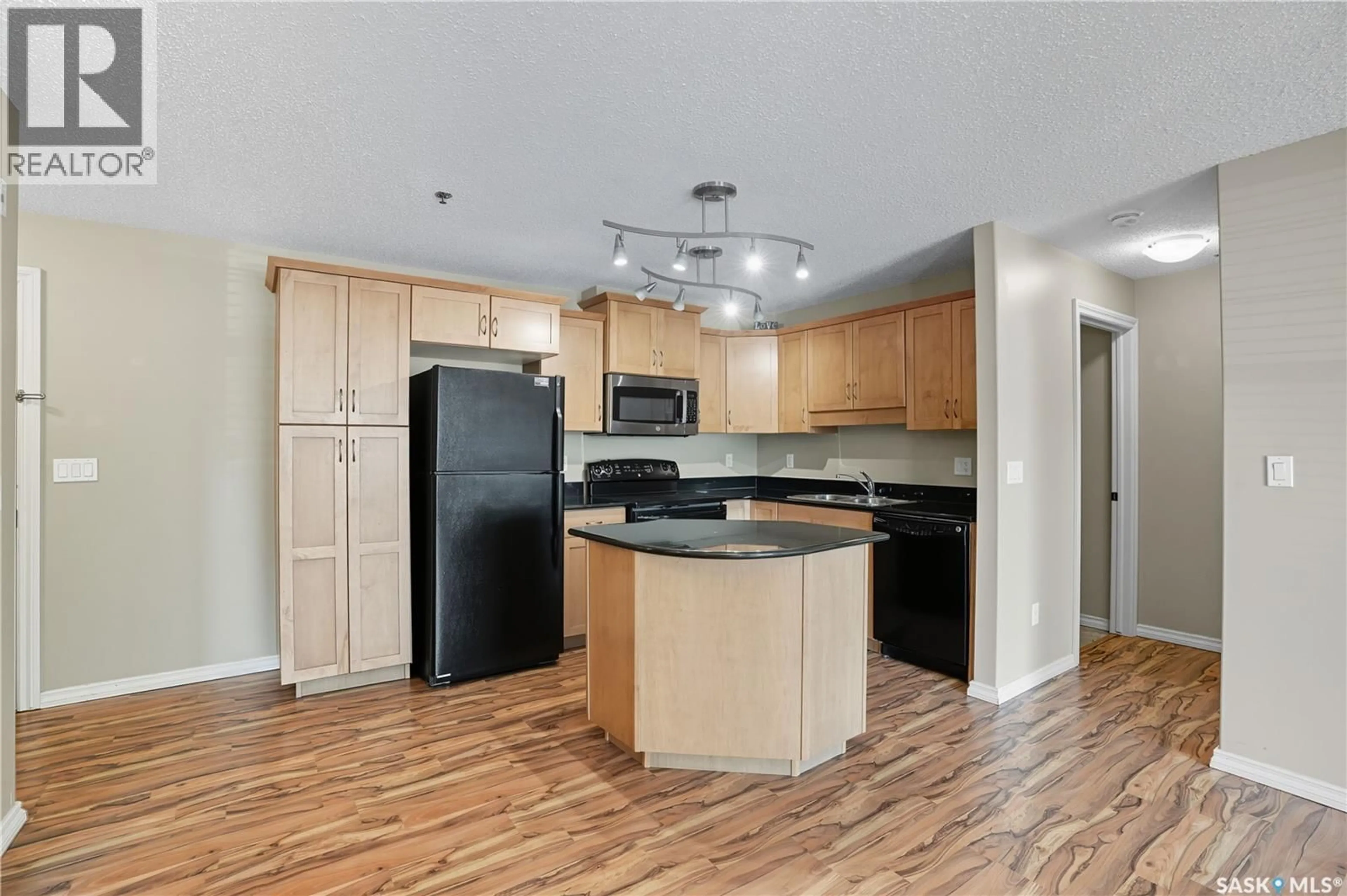 Open concept kitchen, unknown for B103 - 103 WELLMAN CRESCENT, Saskatoon Saskatchewan S7T0C1